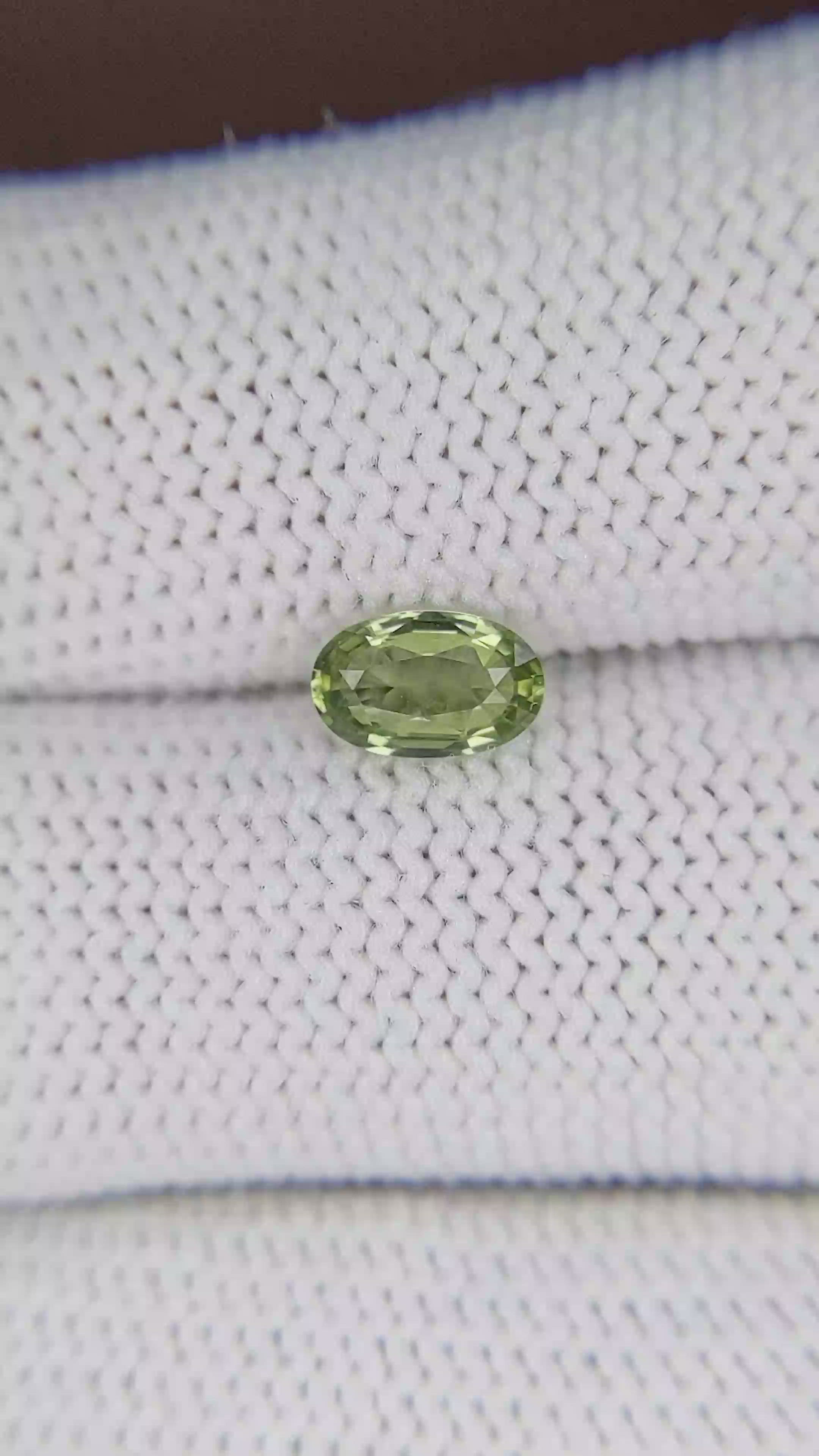 0.82 Ct. Yellowish Green Sapphire from Tanzania Size Video
