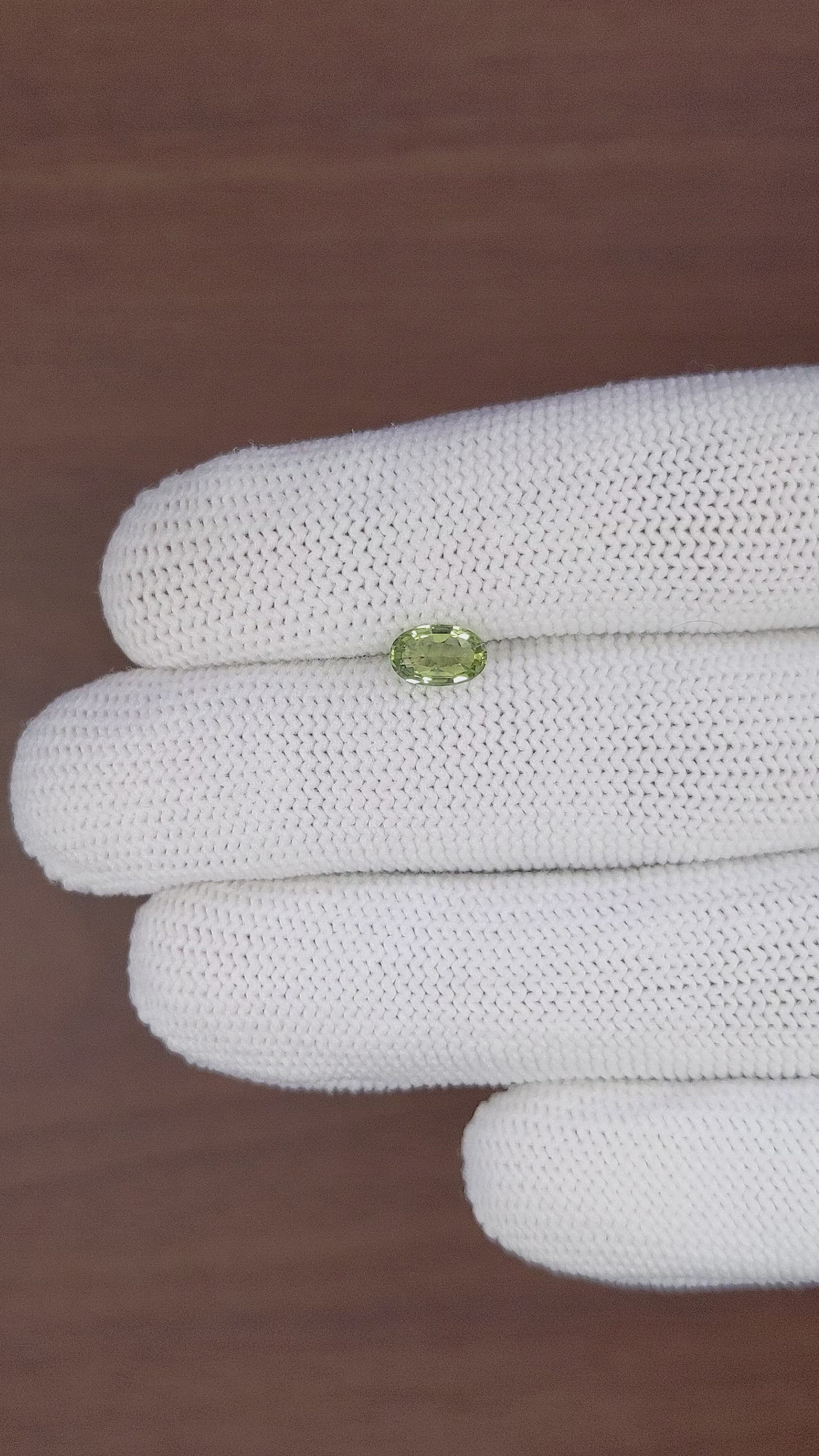 0.82 Ct. Yellowish Green Sapphire from Tanzania Size Video