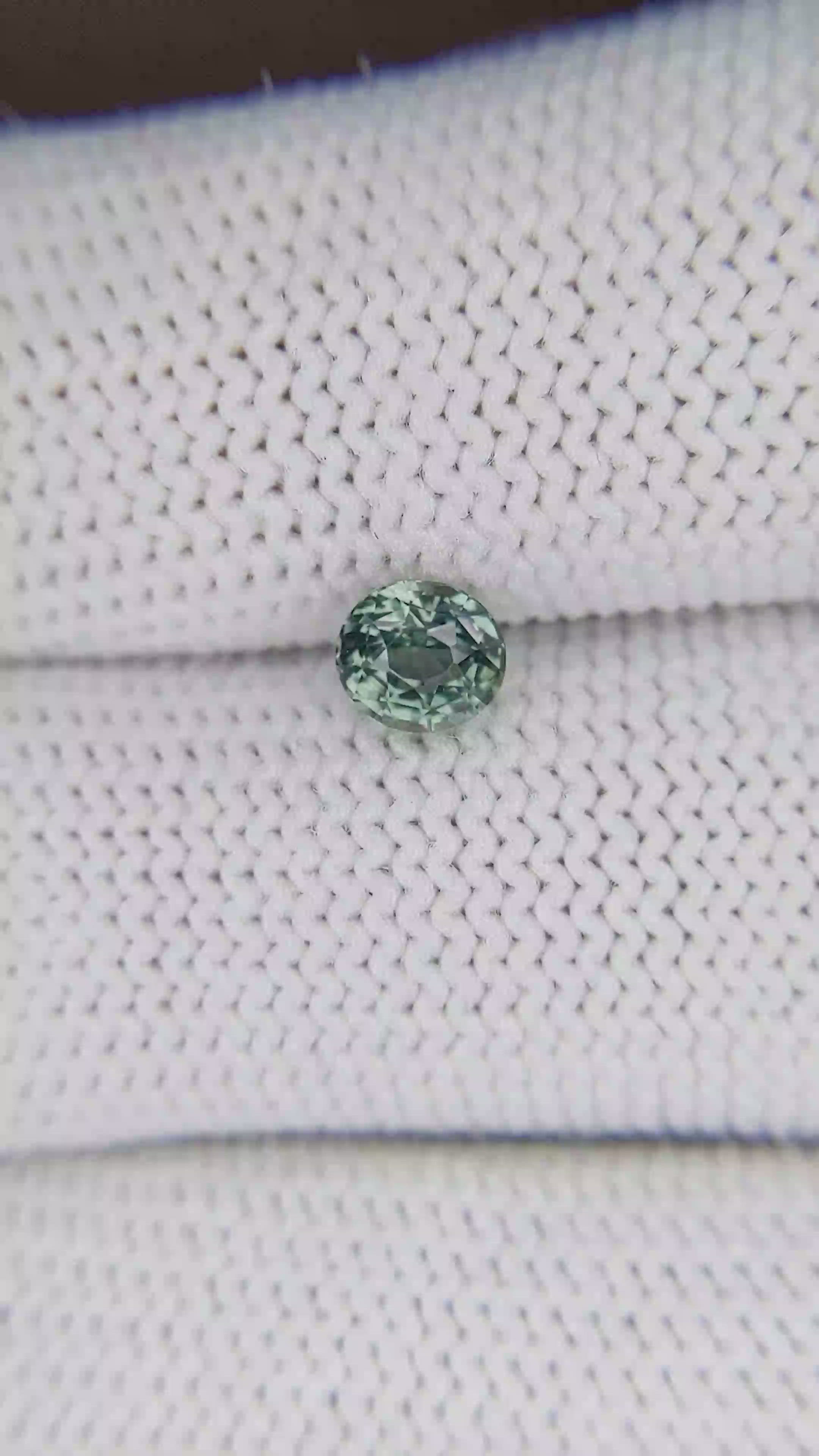 0.74 Ct. Bluish Green Sapphire from Tanzania Size Video