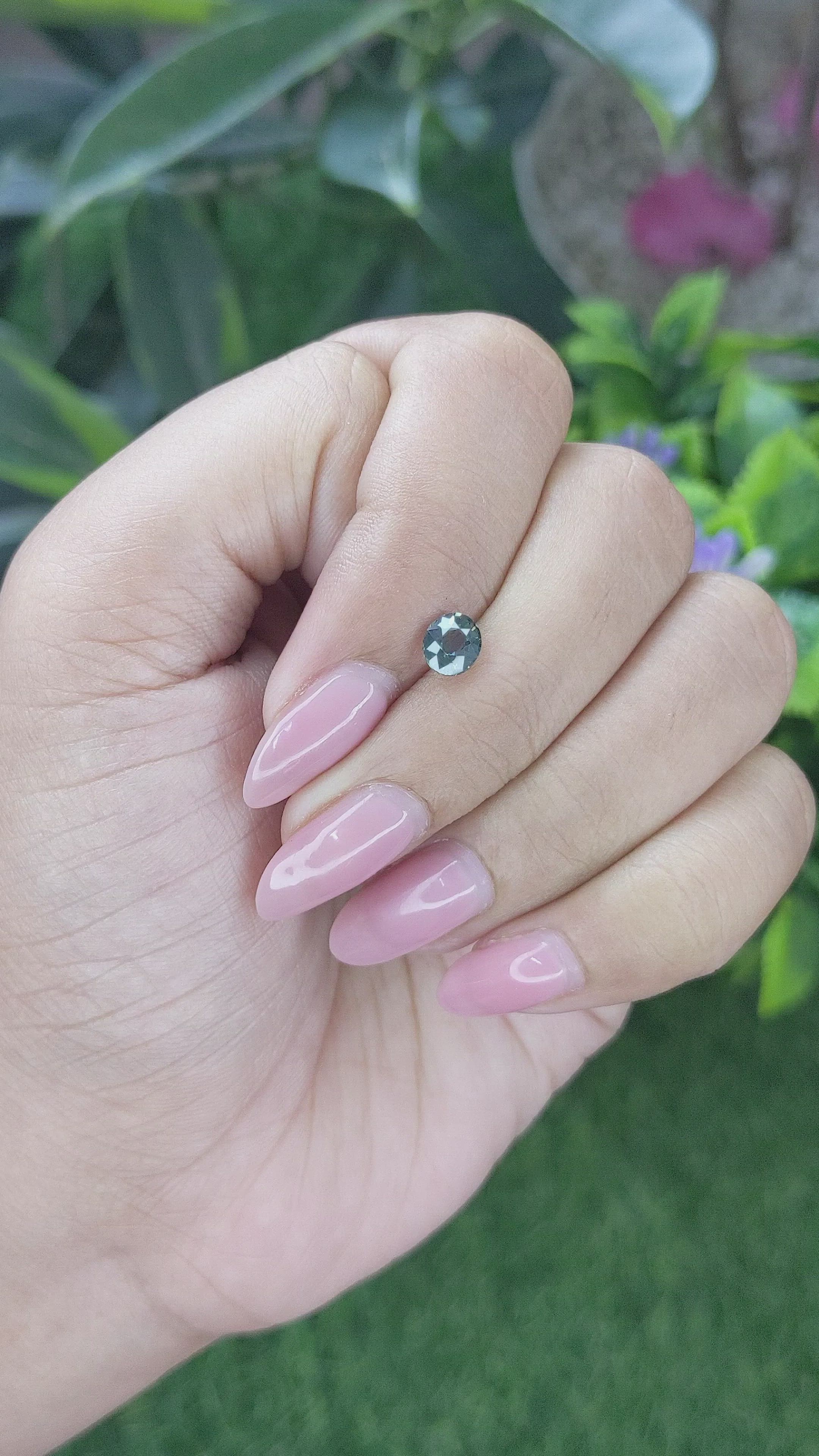 0.79 Ct. Bluish Green Sapphire from Tanzania Size Video