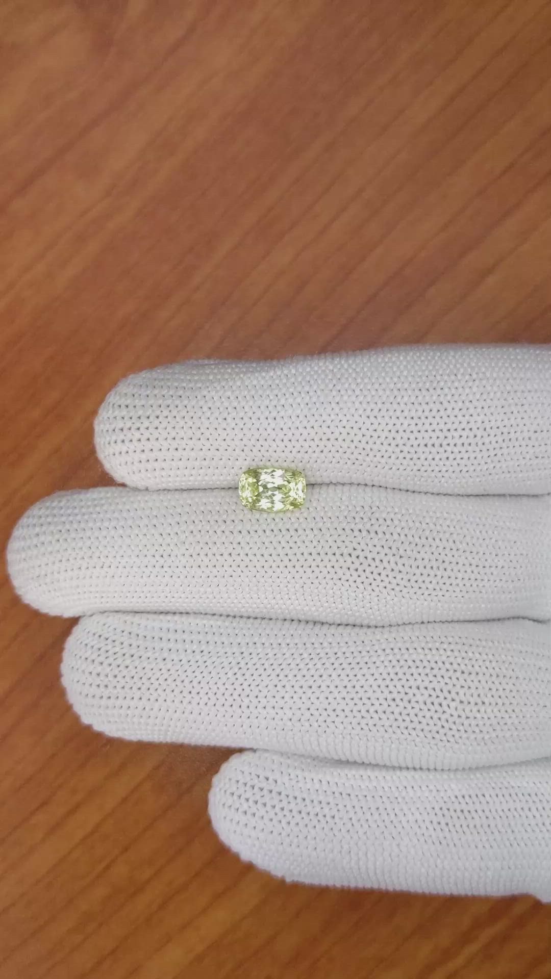 1.81 Ct. Greenish Yellow Sapphire from Montana Size Video