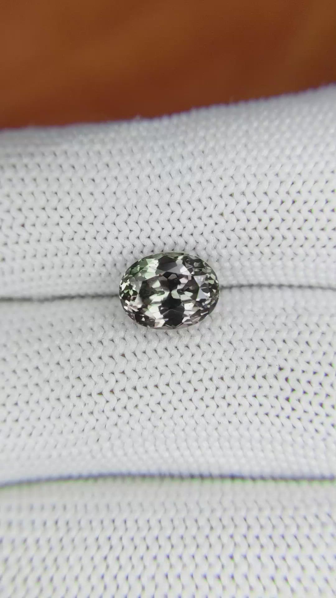 2.69 Ct. Brownish Green Sapphire from Montana Size Video