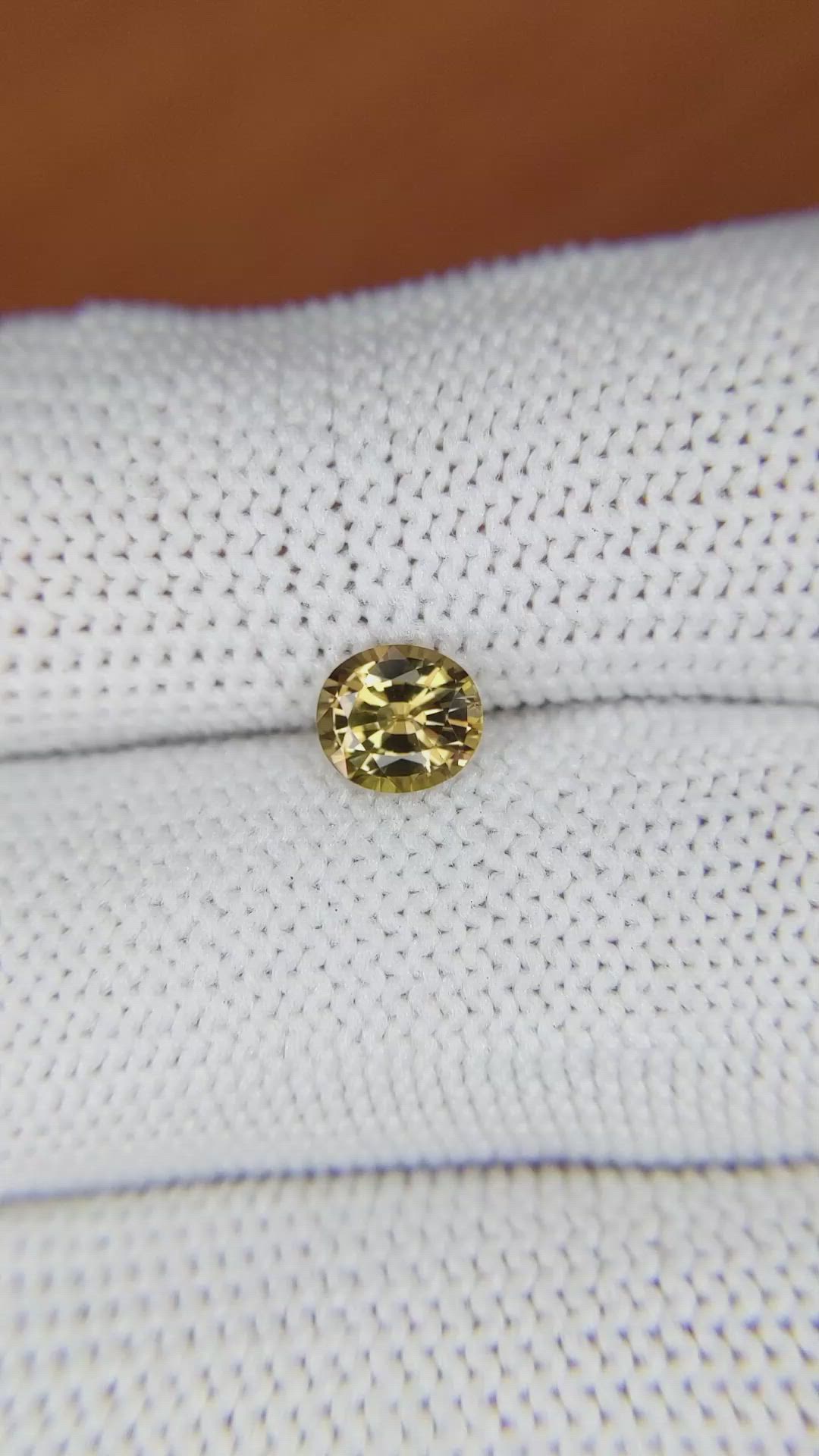 0.89 Ct. Yellowish Brown Sapphire from Madagascar Size Video