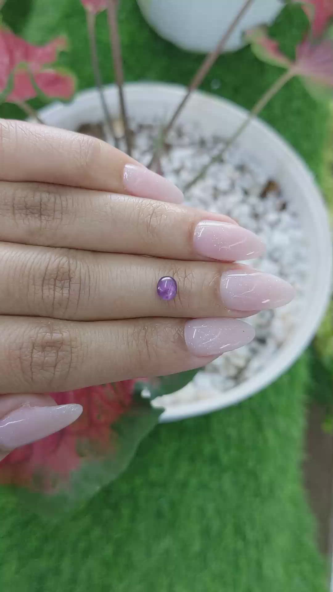 0.81 Ct. Pinkish Purple Star Sapphire from Ceylon (Sri Lanka) Size Video