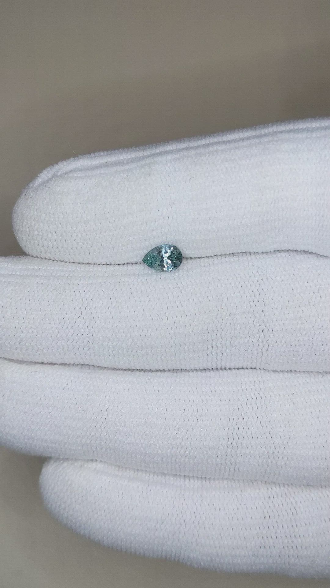 0.51 Ct. Bluish Green Sapphire from Montana Size Video