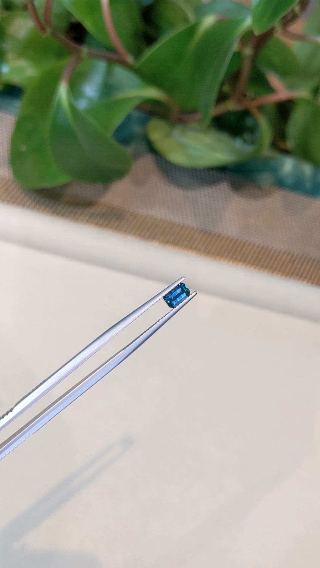 0.52 Ct. Bluish Green Sapphire from Montana Size Video