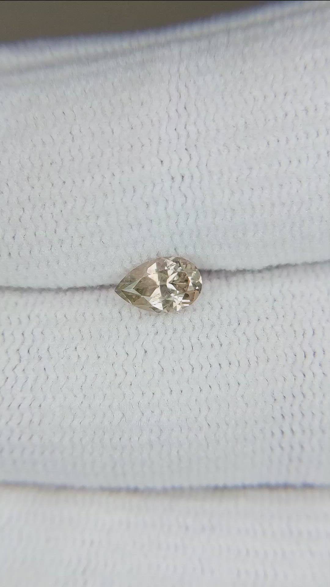 0.57 Ct. Yellowish Brown Sapphire from Montana Size Video