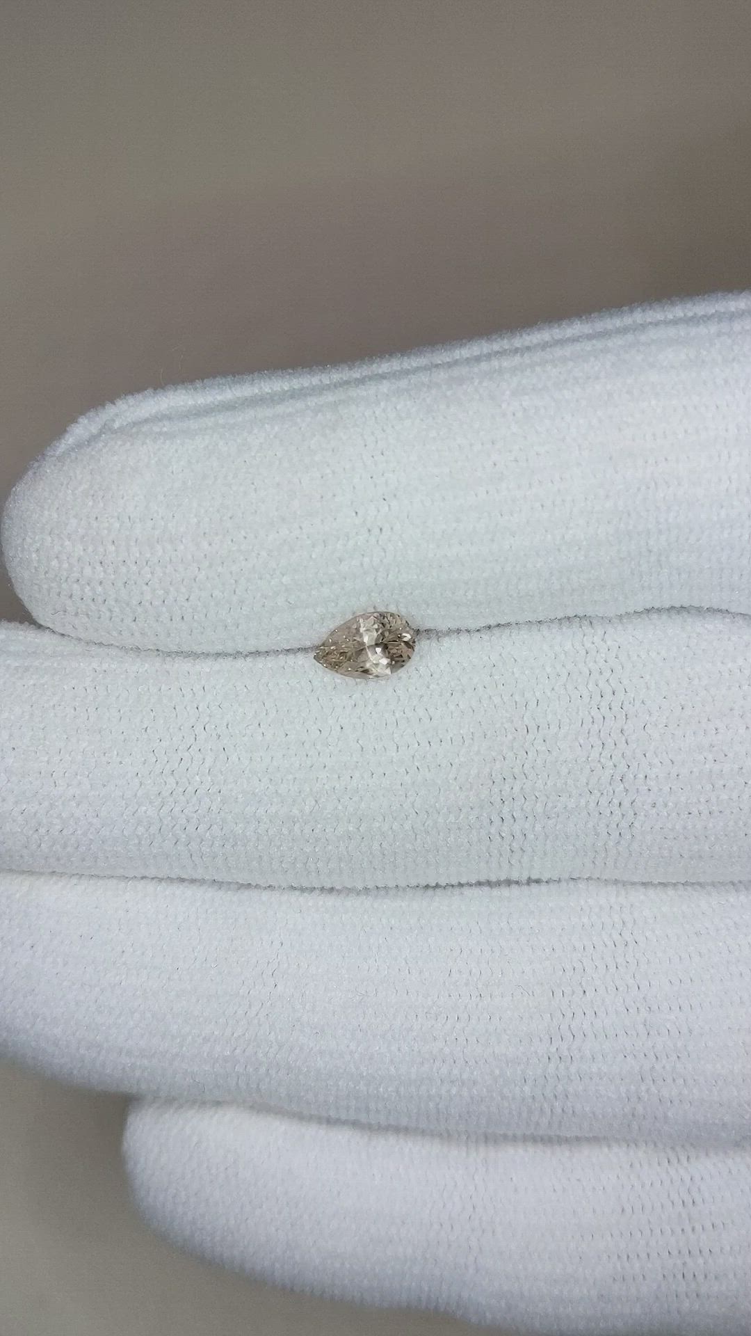 0.57 Ct. Yellowish Brown Sapphire from Montana Size Video