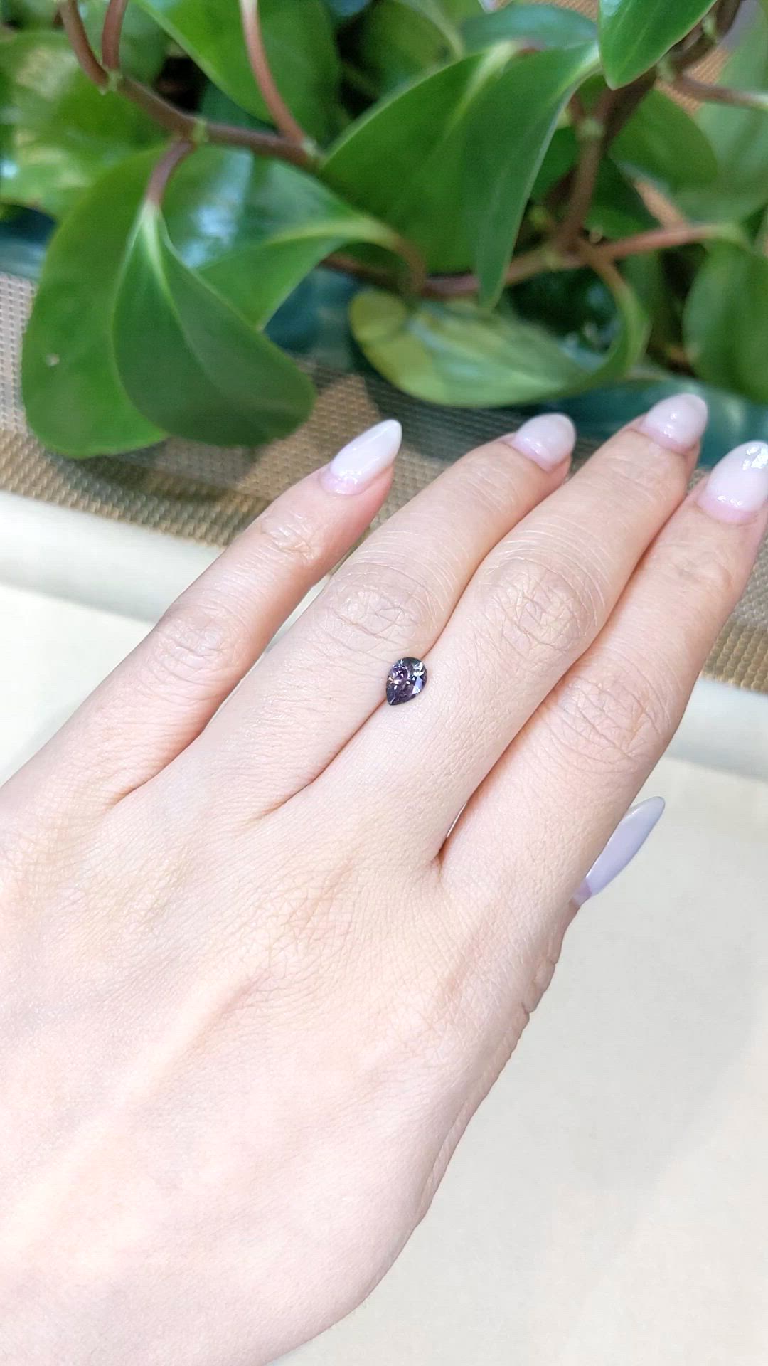 0.58 Ct. Purple Sapphire from Montana Size Video