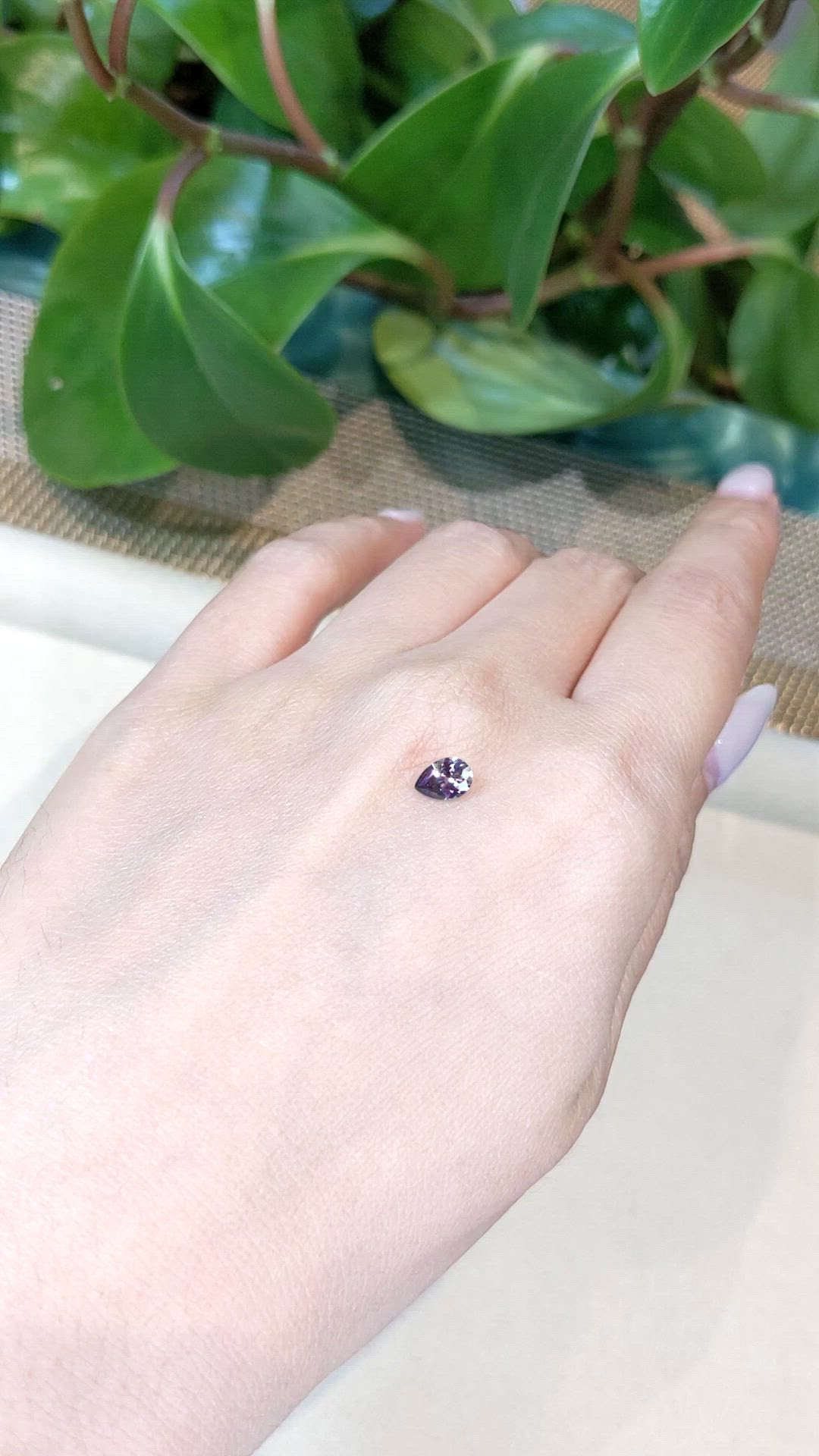 0.58 Ct. Purple Sapphire from Montana Size Video