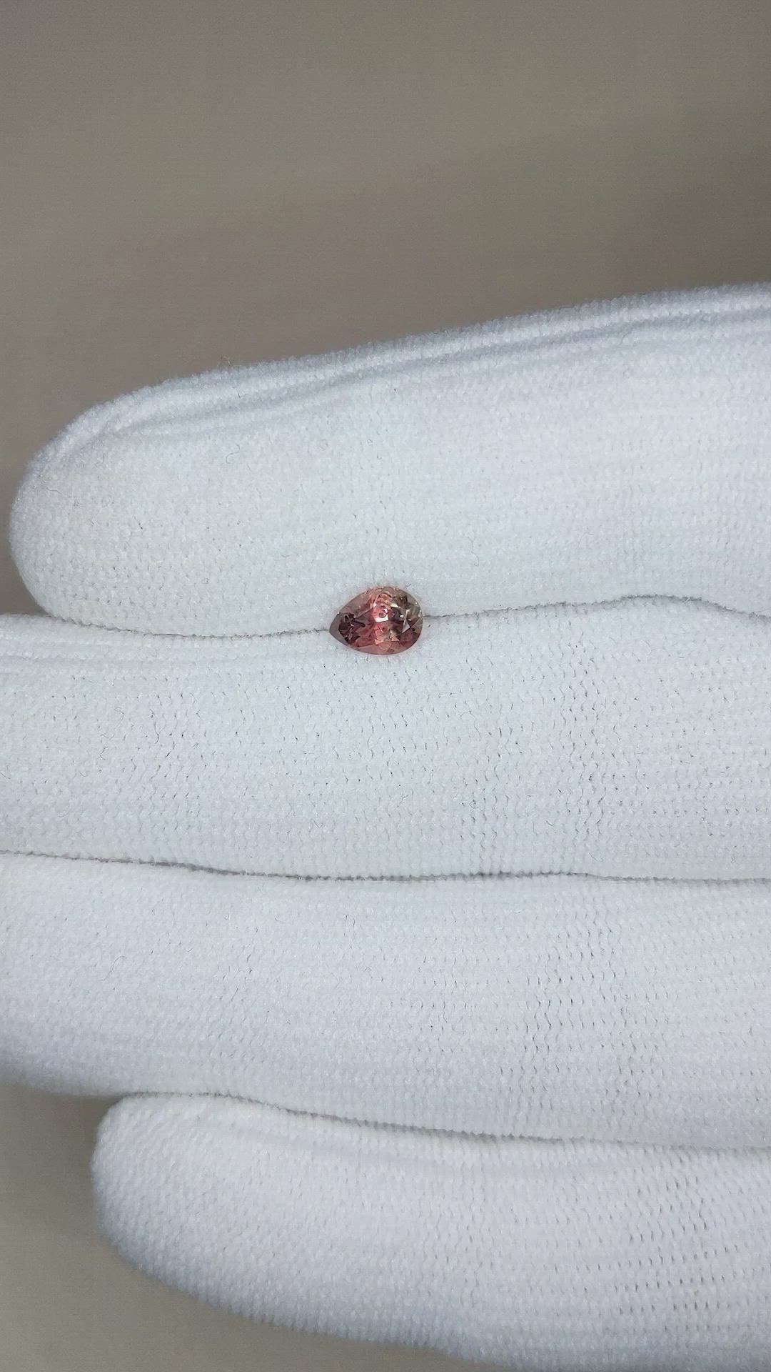 0.58 Ct. Reddish Orange Sapphire from Montana Size Video