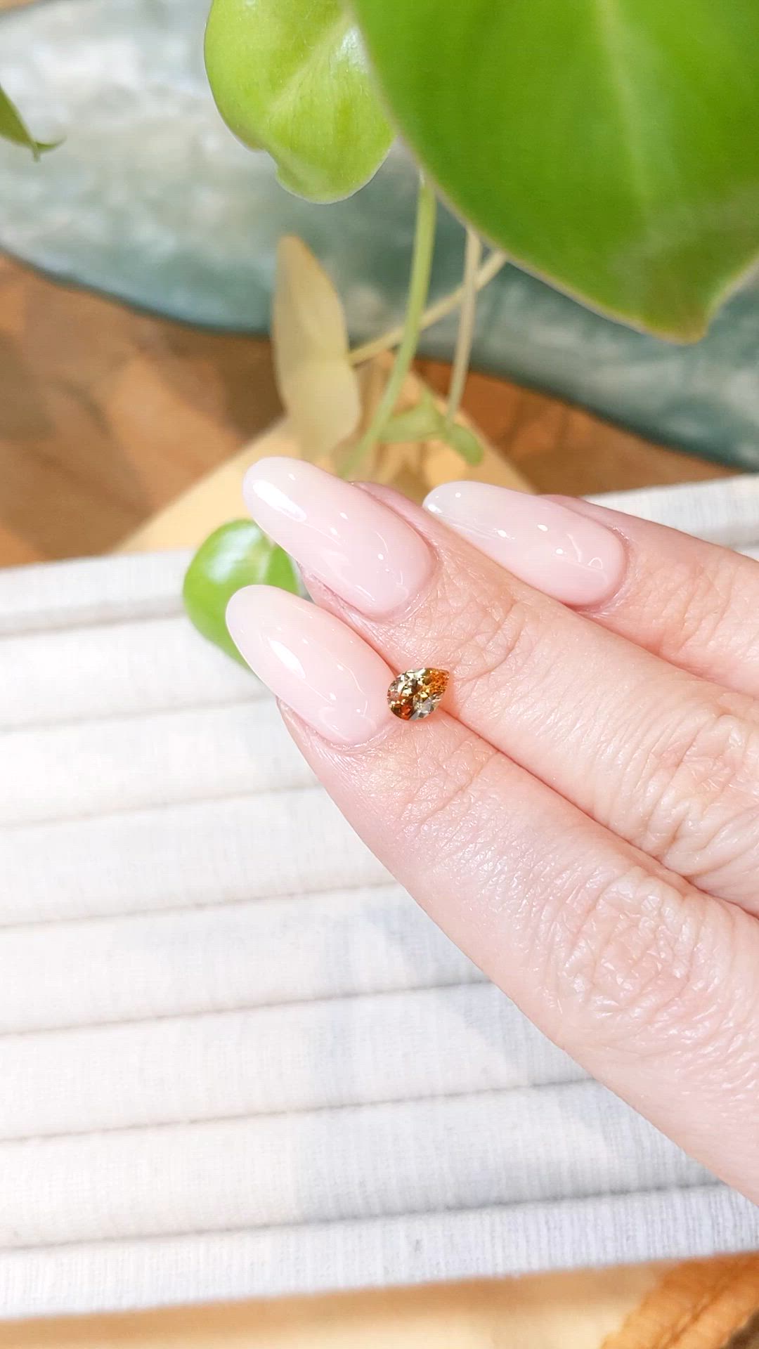 0.62 Ct. Orangish Yellow Sapphire from Montana Size Video