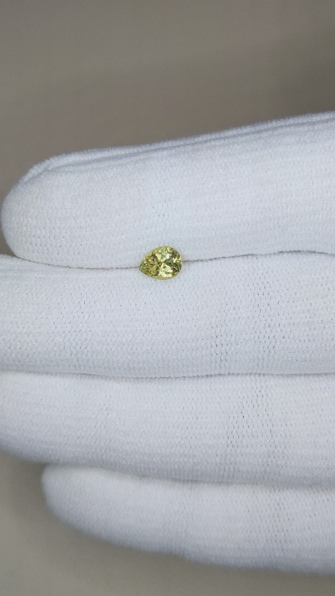 0.64 Ct. Greenish Yellow Sapphire from Montana Size Video