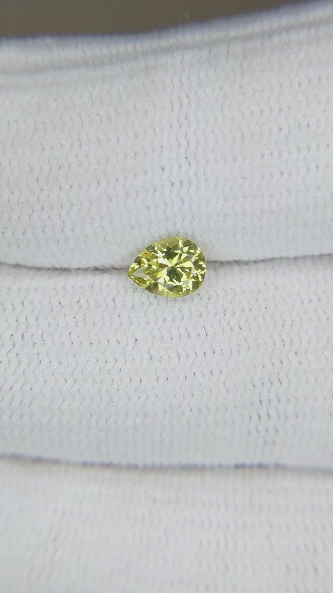 0.64 Ct. Greenish Yellow Sapphire from Montana Size Video