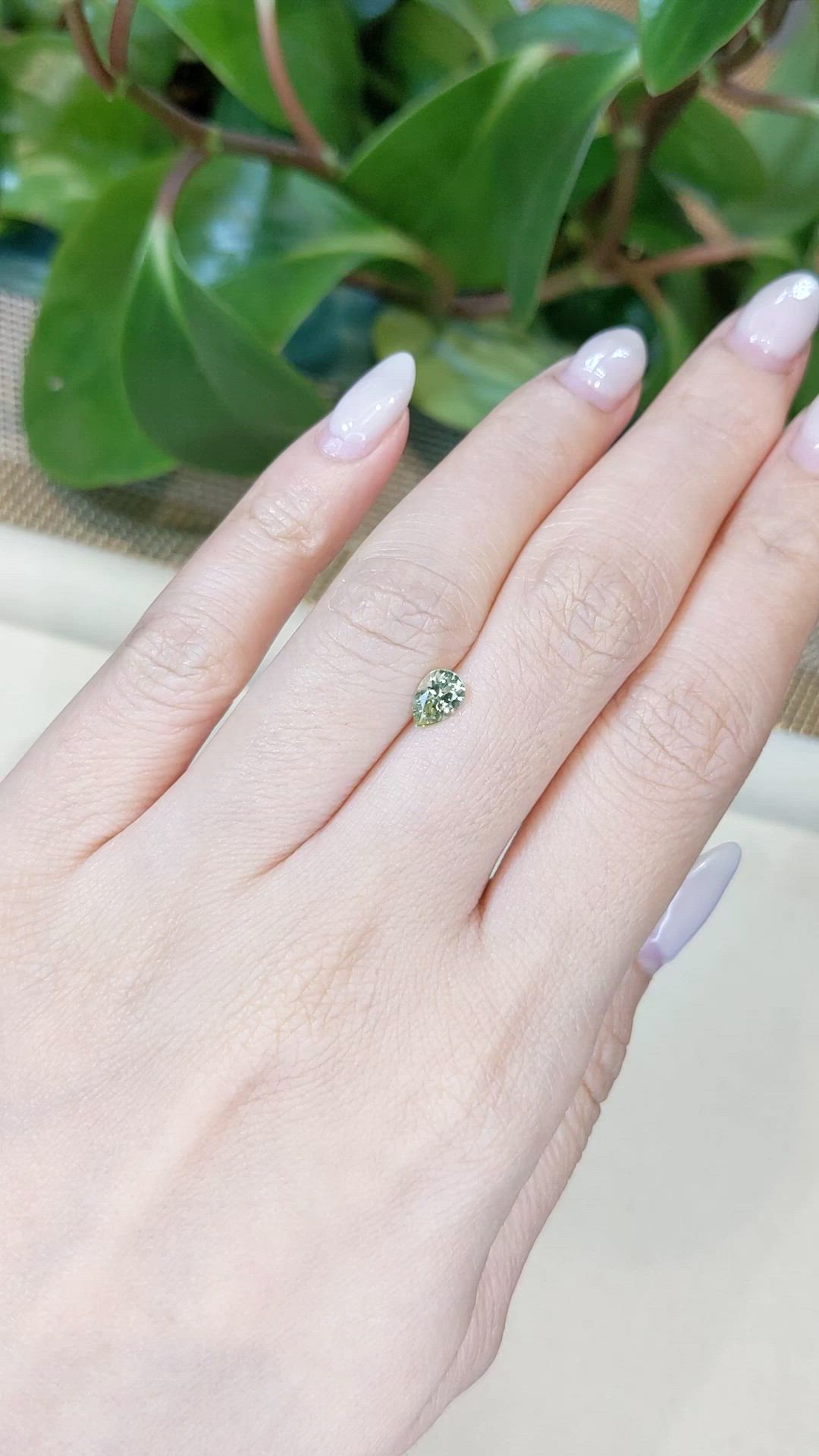 0.68 Ct. Yellowish Green Sapphire from Montana Size Video