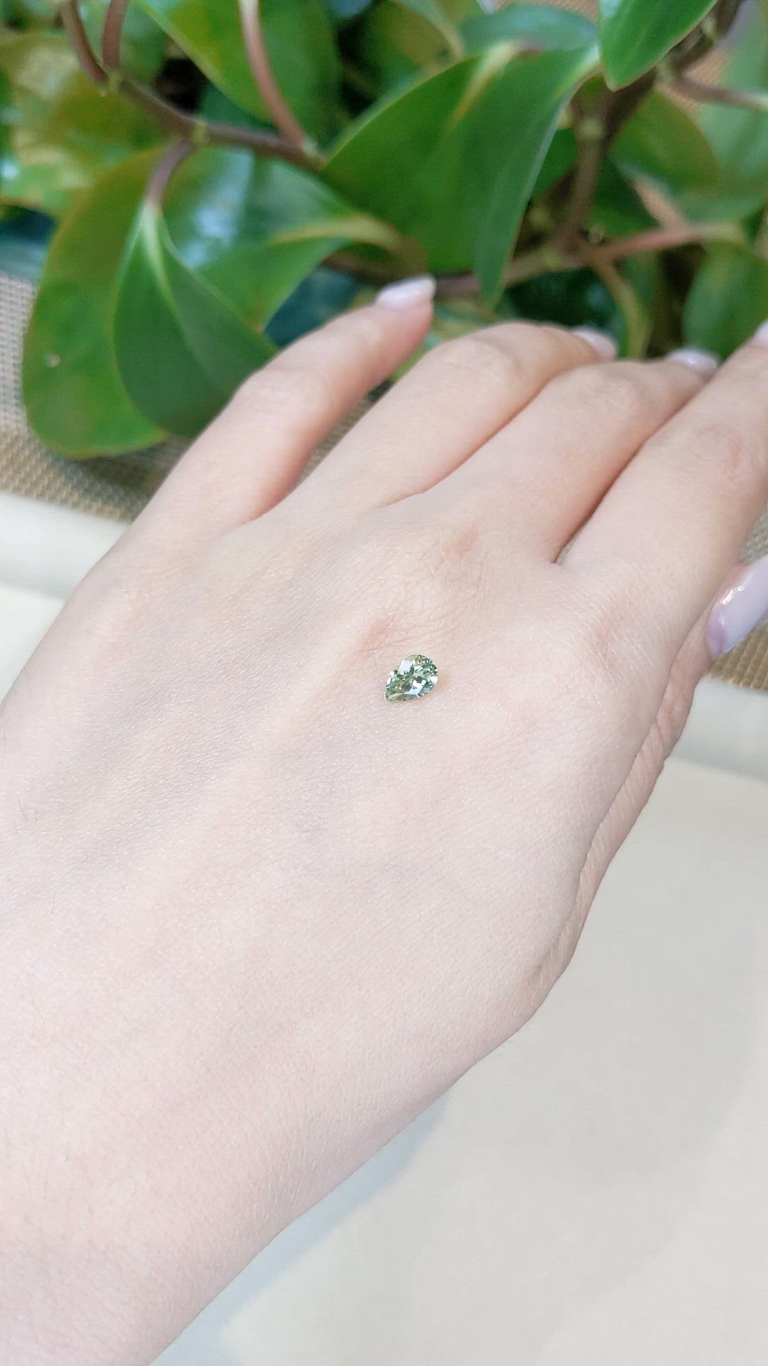 0.68 Ct. Yellowish Green Sapphire from Montana Size Video