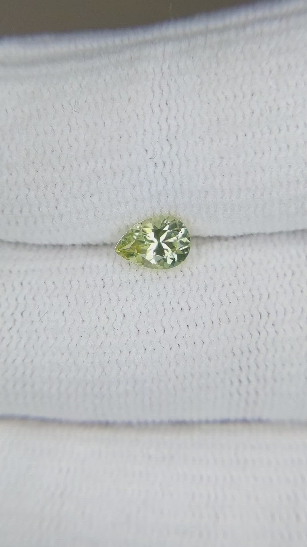 0.68 Ct. Yellowish Green Sapphire from Montana Size Video