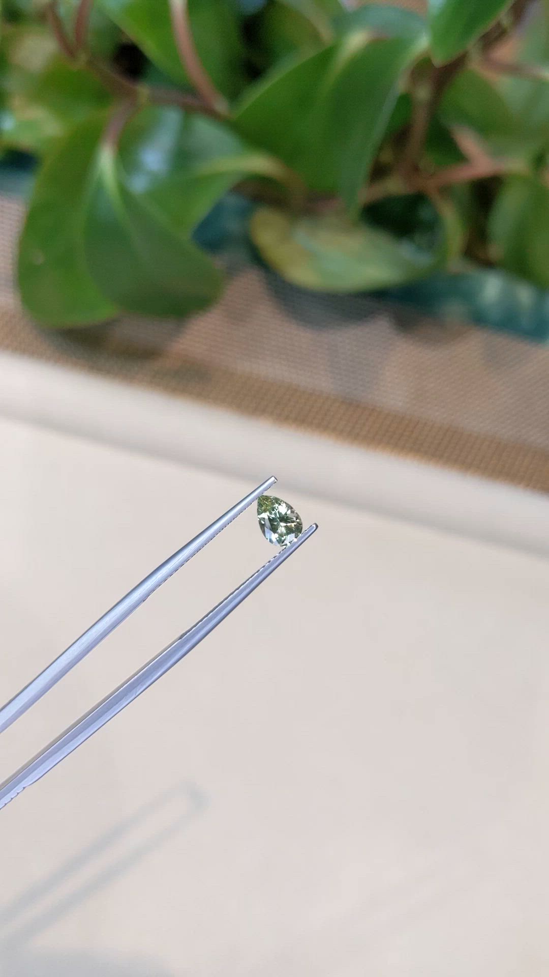 0.68 Ct. Yellowish Green Sapphire from Montana Size Video