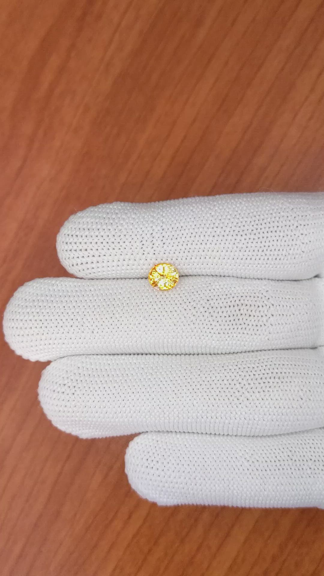 1.19 Ct. Yellowish Orange Sapphire from Ceylon (Sri Lanka) Size Video