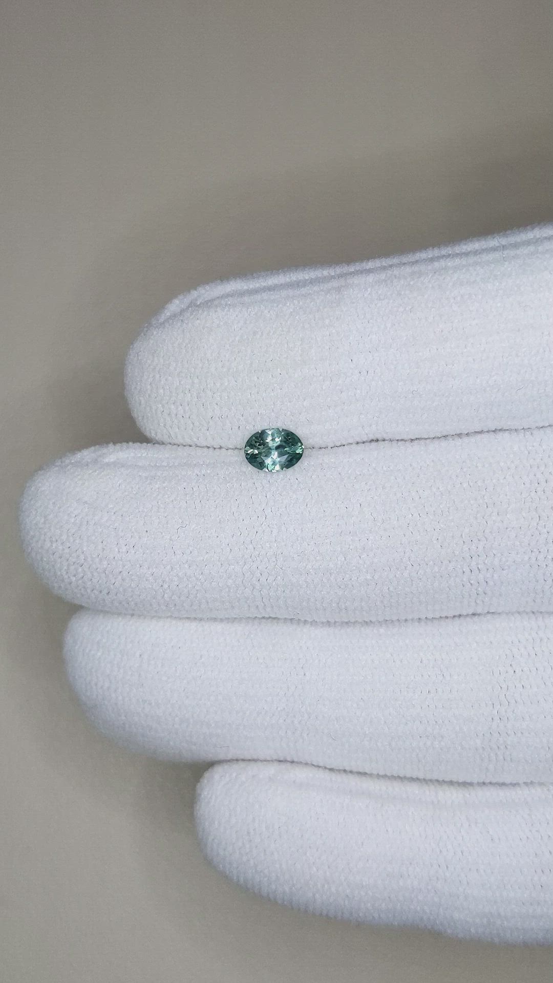 0.41 Ct. Bluish Green Sapphire from Montana Size Video