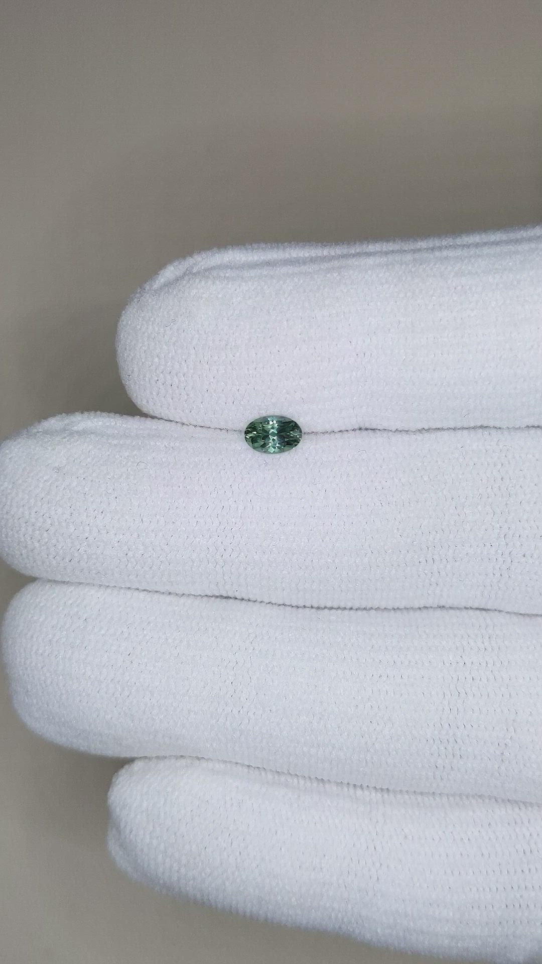 0.41 Ct. Green Sapphire from Montana Size Video