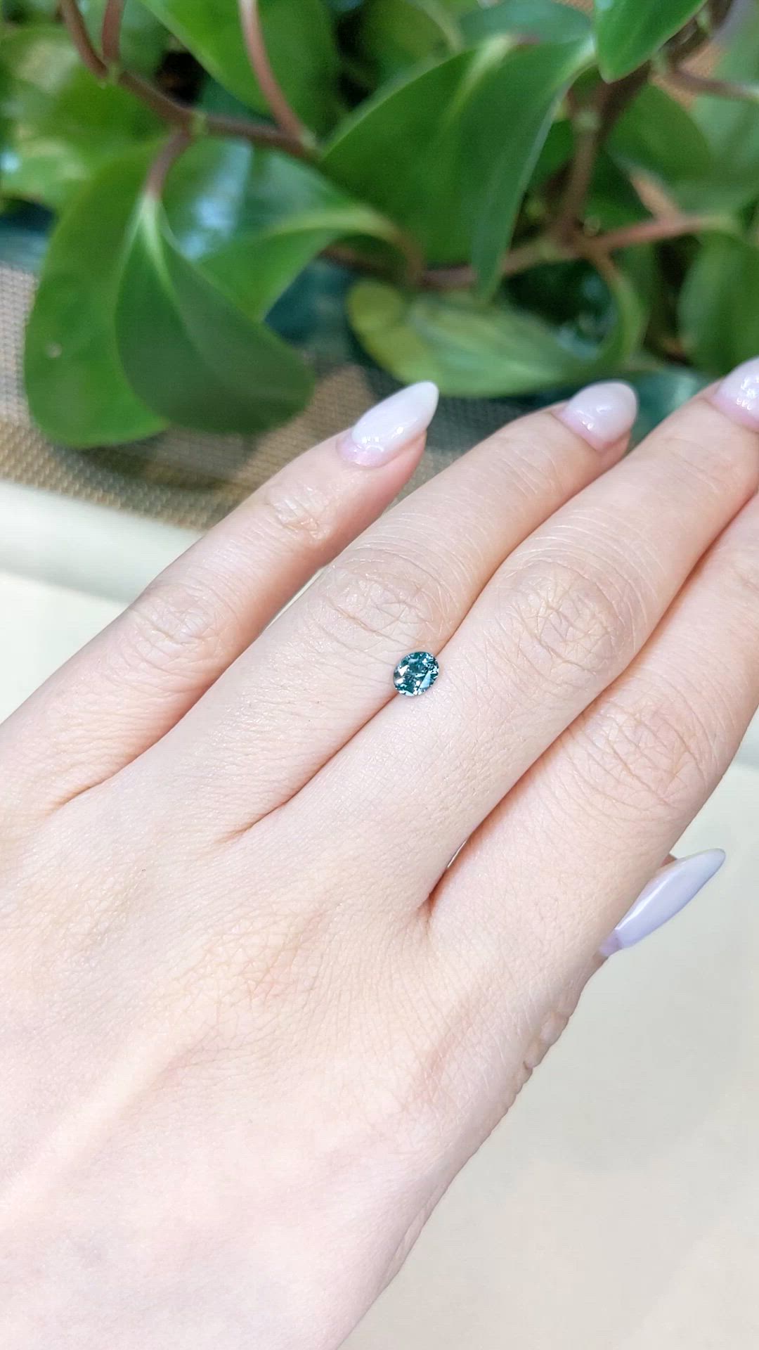 0.41 Ct. Bluish Green Sapphire from Montana Size Video