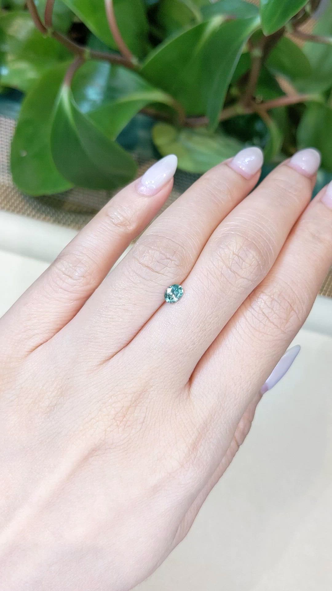 0.42 Ct. Bluish Green Sapphire from Montana Size Video