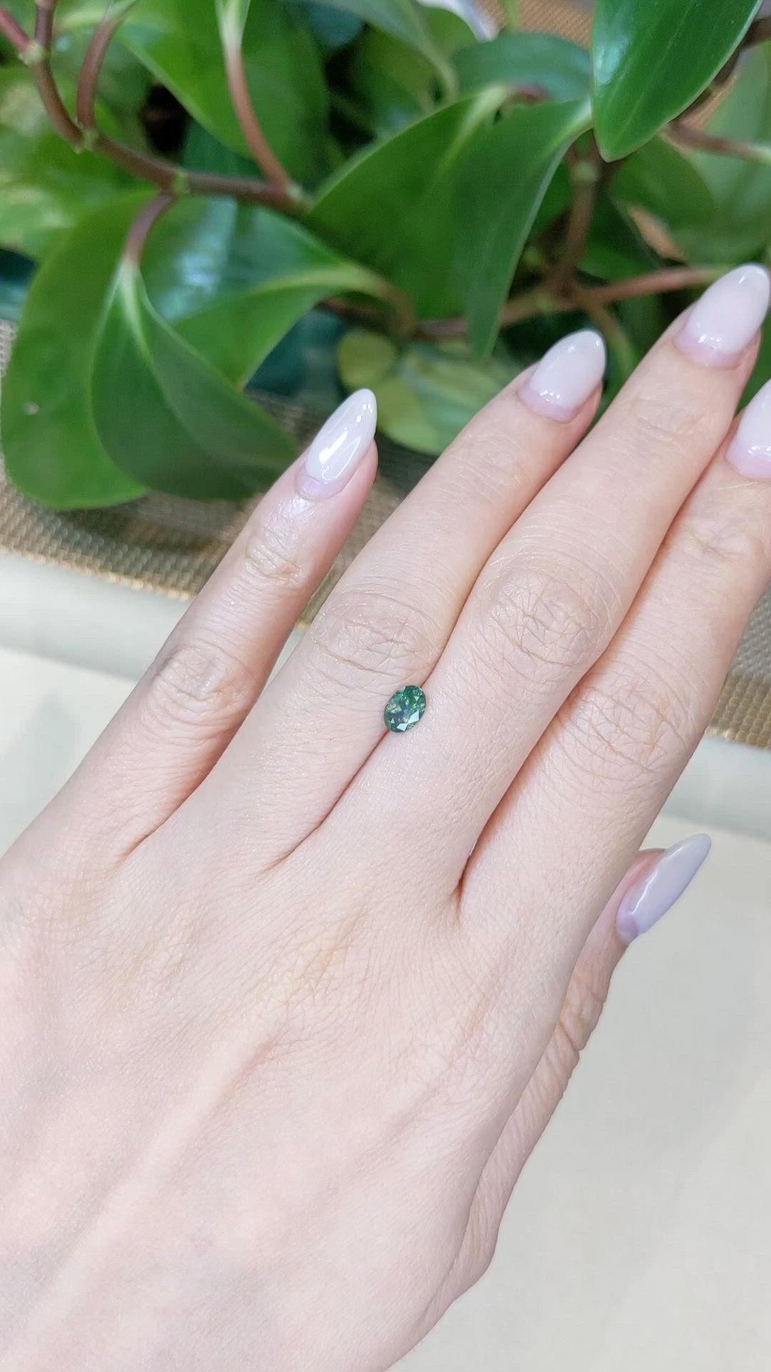 0.44 Ct. Bluish Green Sapphire from Montana Size Video
