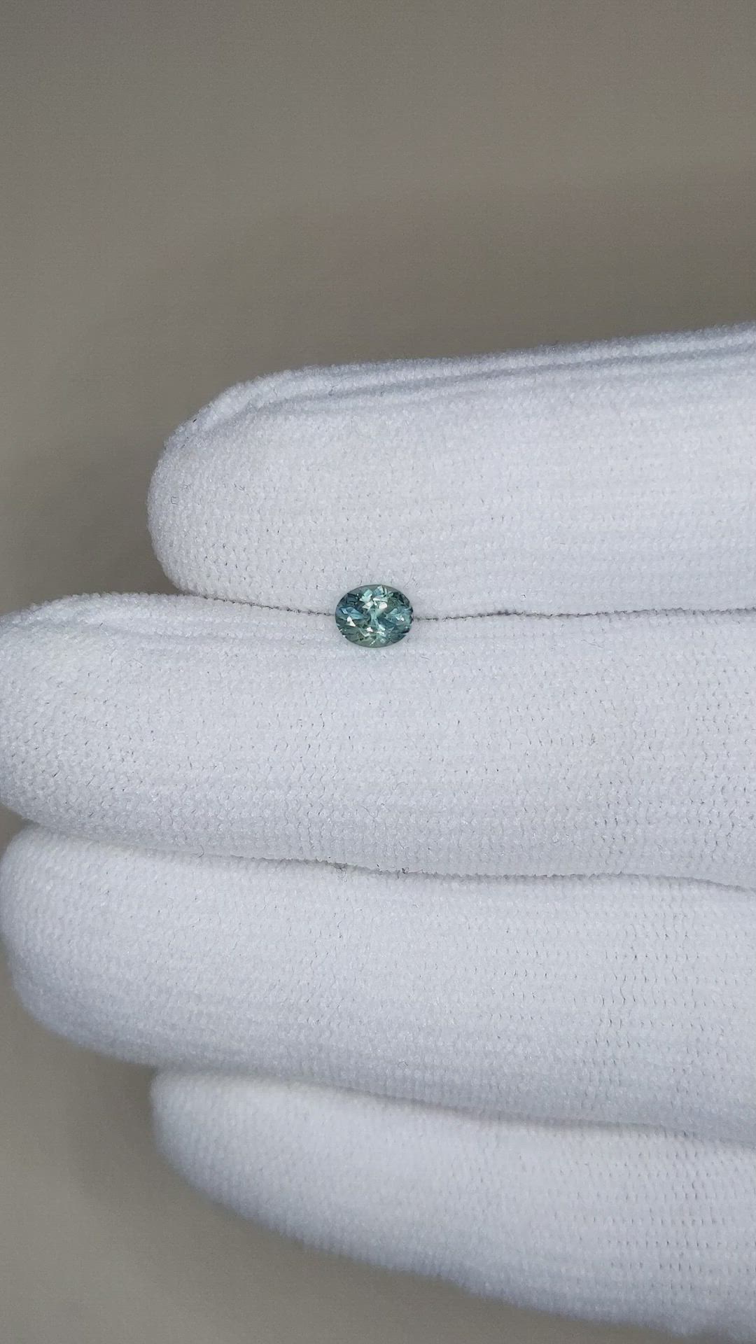0.44 Ct. Bluish Green Sapphire from Montana Size Video