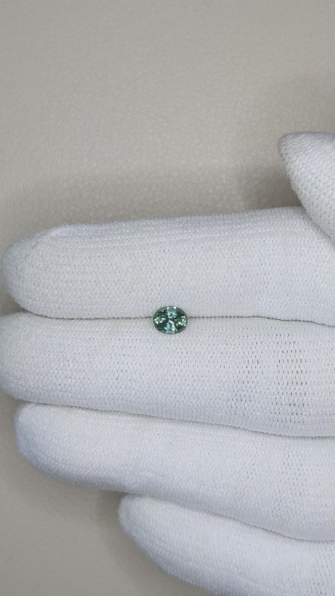 0.45 Ct. Bluish Green Sapphire from Montana Size Video