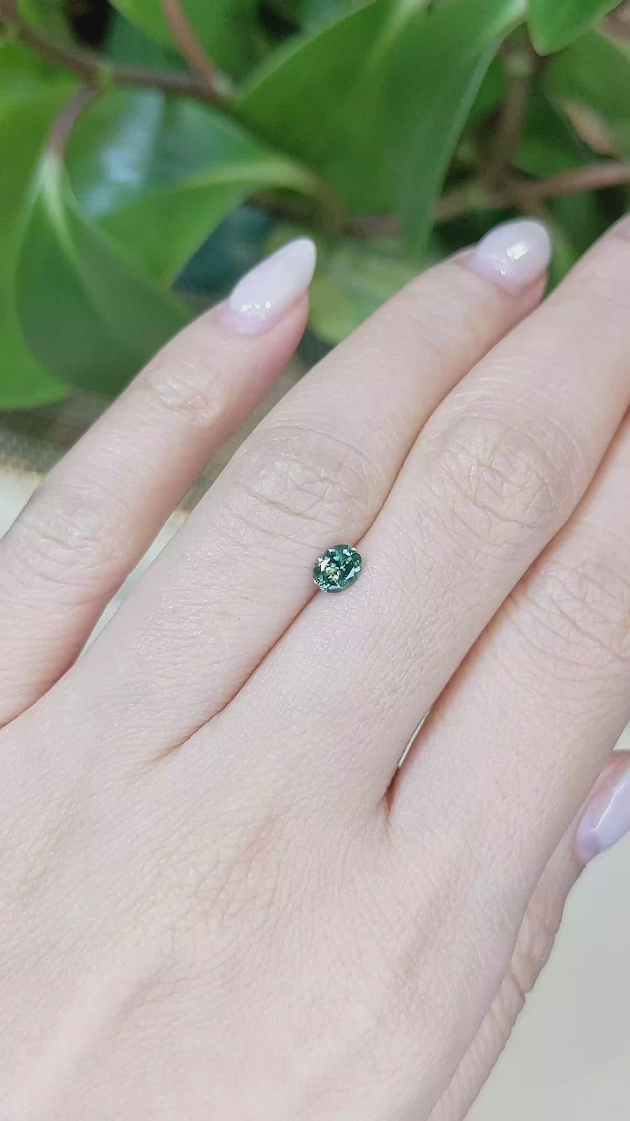 0.45 Ct. Bluish Green Sapphire from Montana Size Video