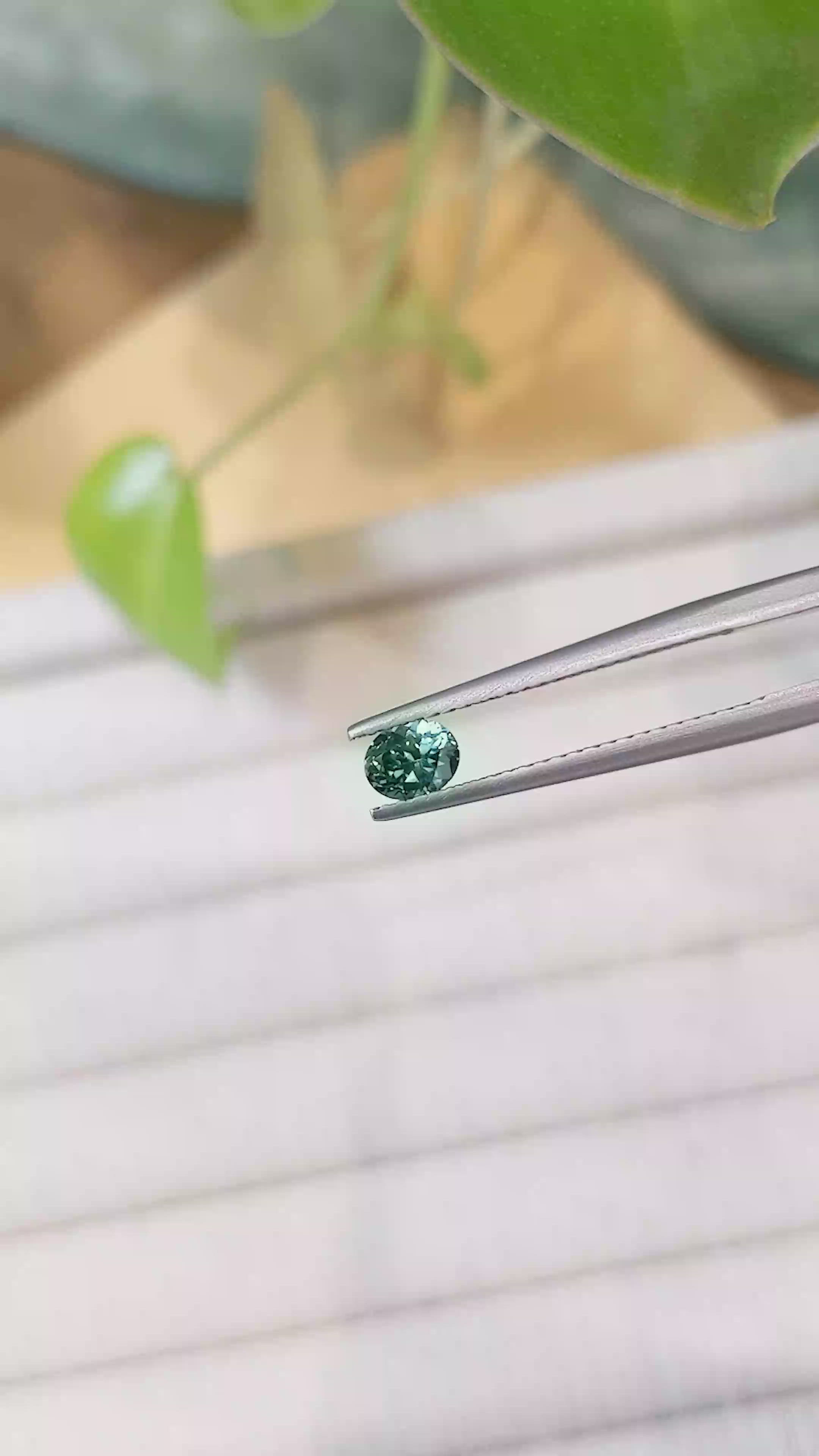 0.45 Ct. Bluish Green Sapphire from Montana Size Video