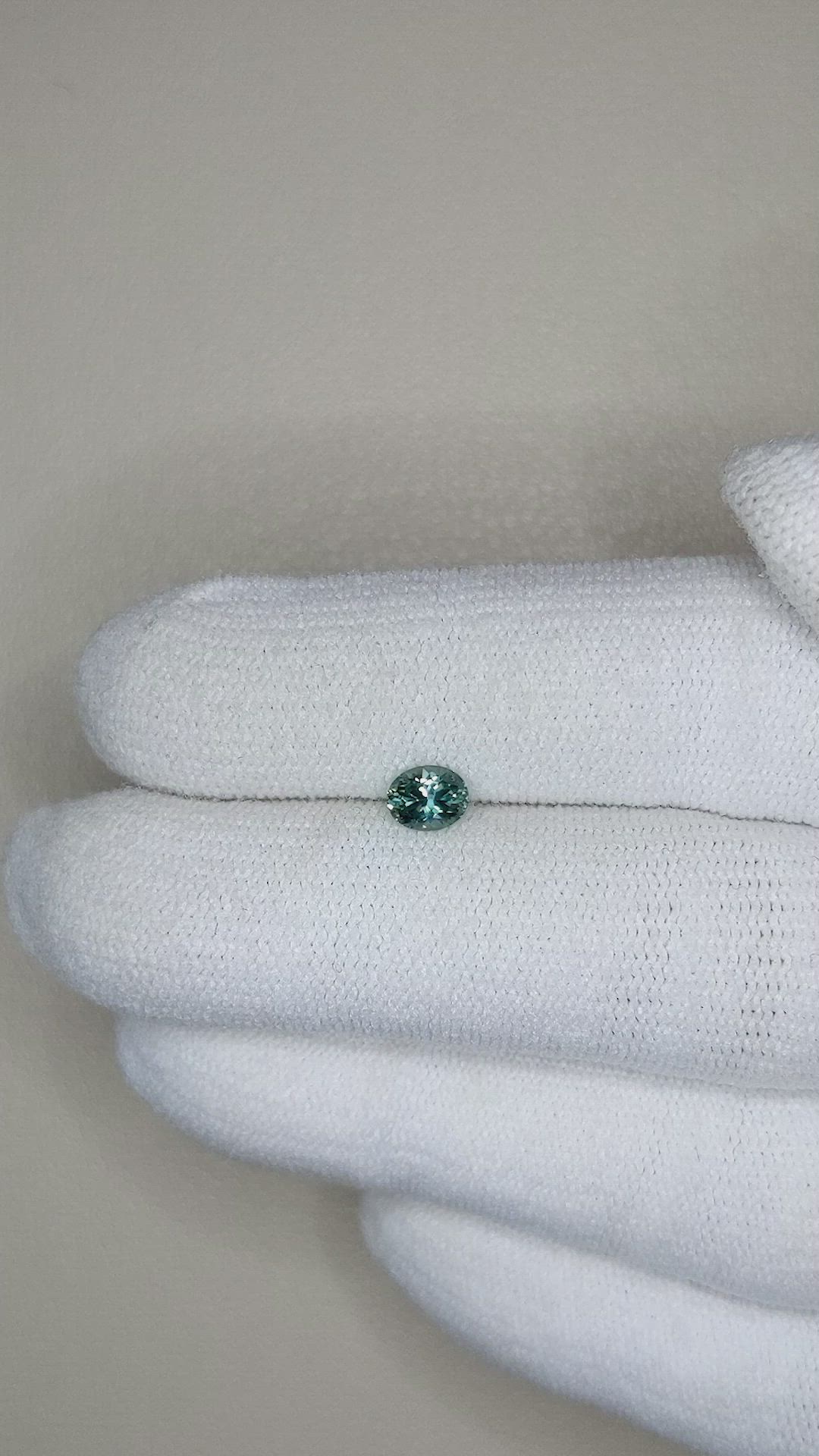 0.45 Ct. Bluish Green Sapphire from Montana Size Video