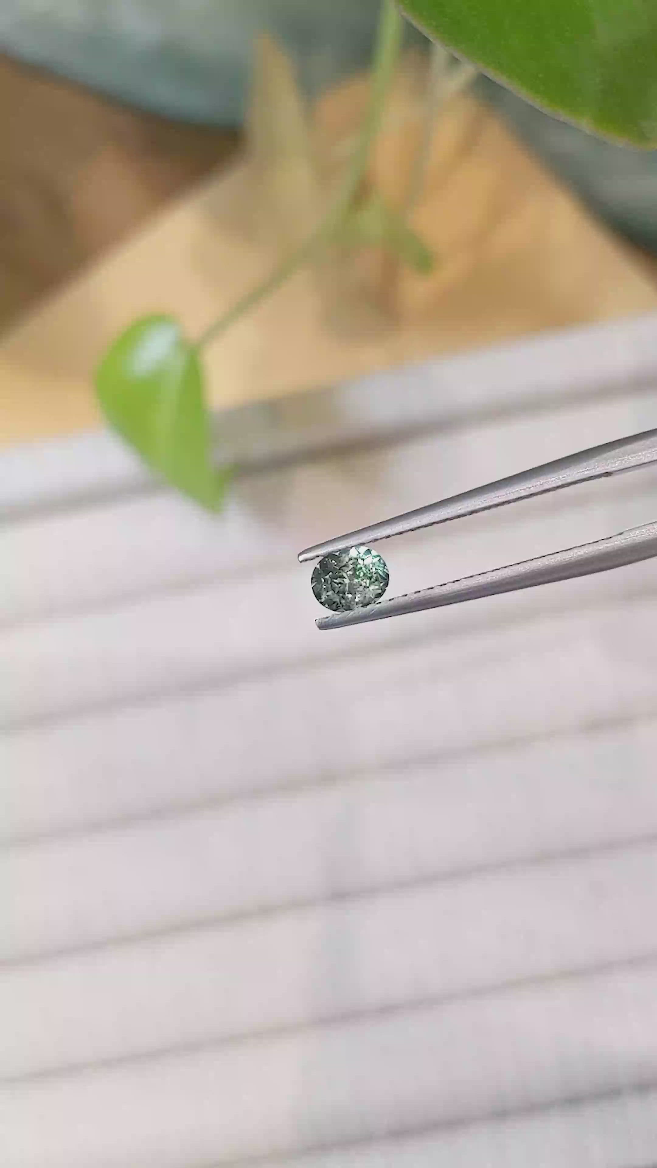 0.46 Ct. Bluish Green Sapphire from Montana Size Video