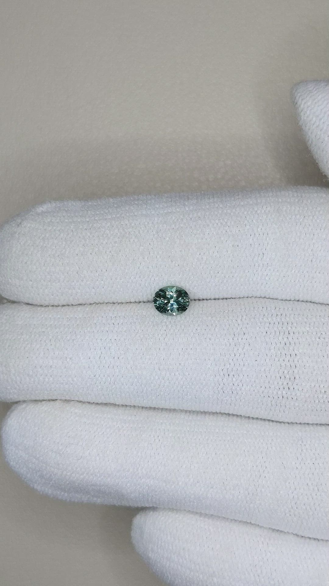 0.47 Ct. Bluish Green Sapphire from Montana Size Video