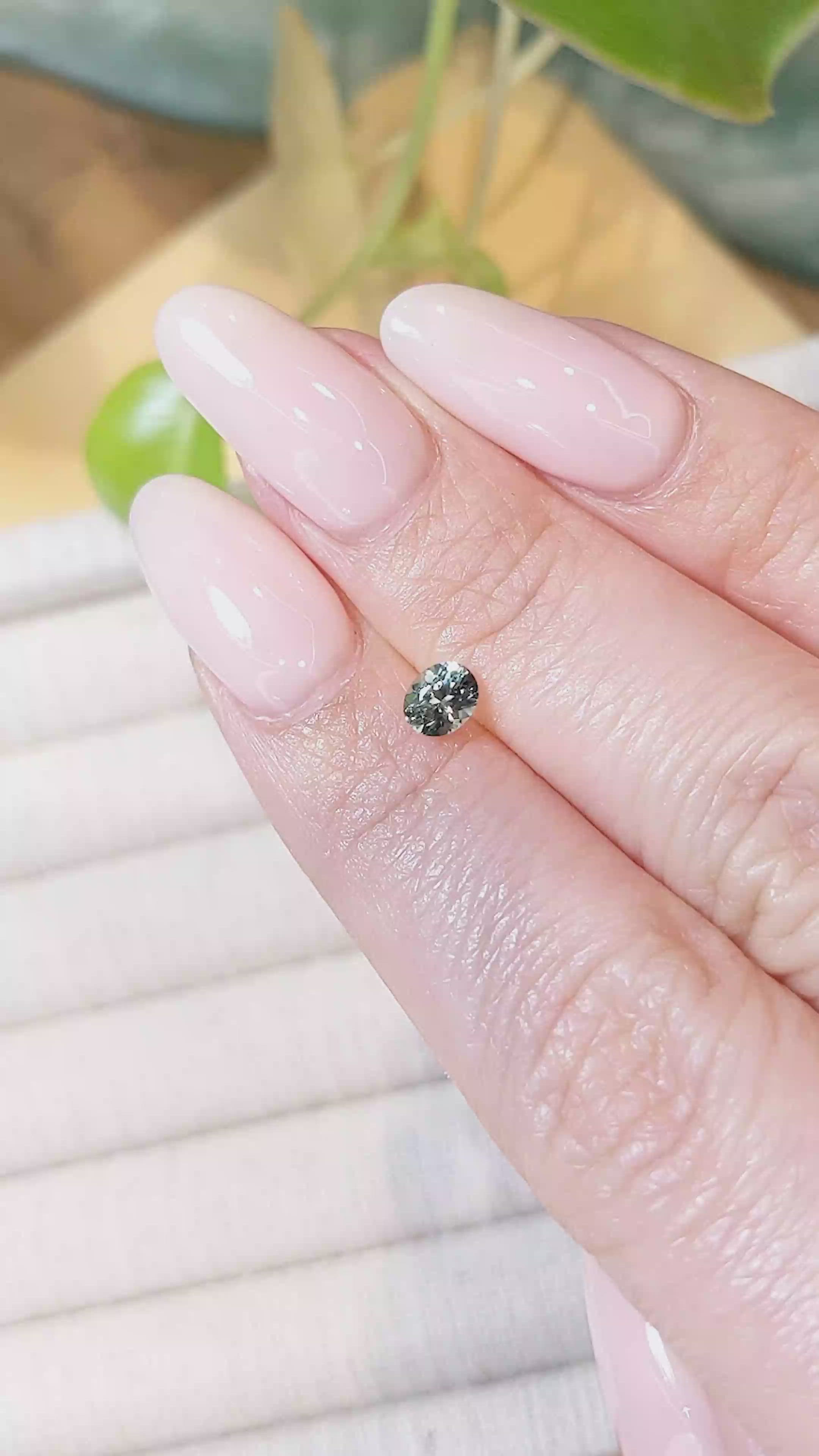 0.47 Ct. Bluish Green Sapphire from Montana Size Video