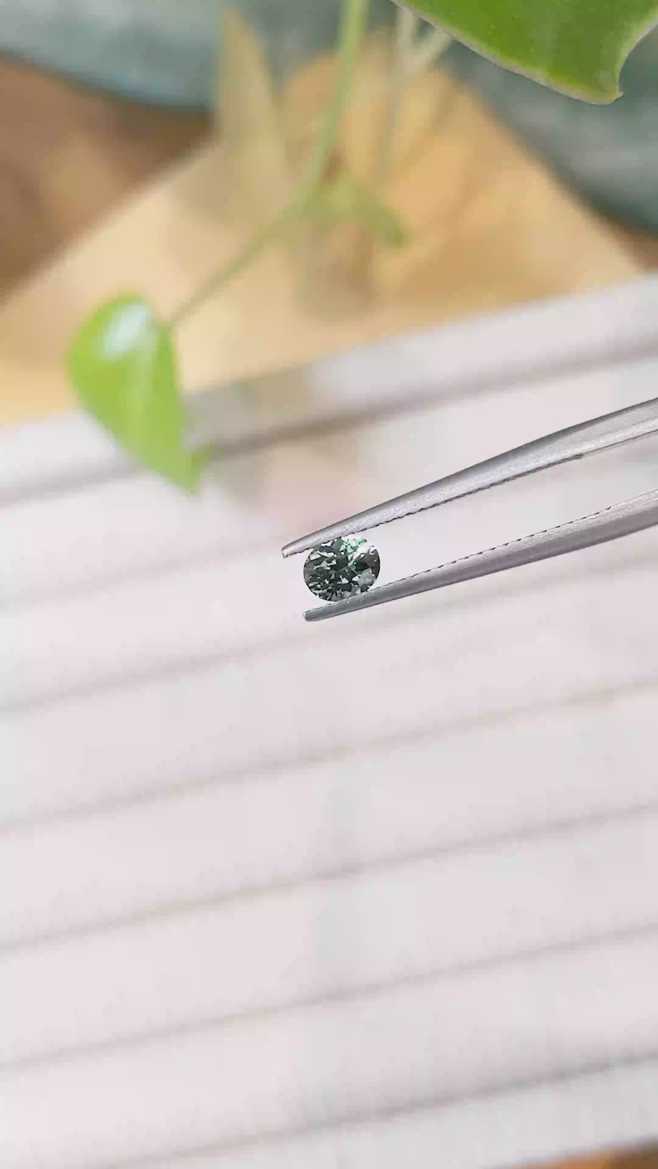 0.47 Ct. Bluish Green Sapphire from Montana Size Video