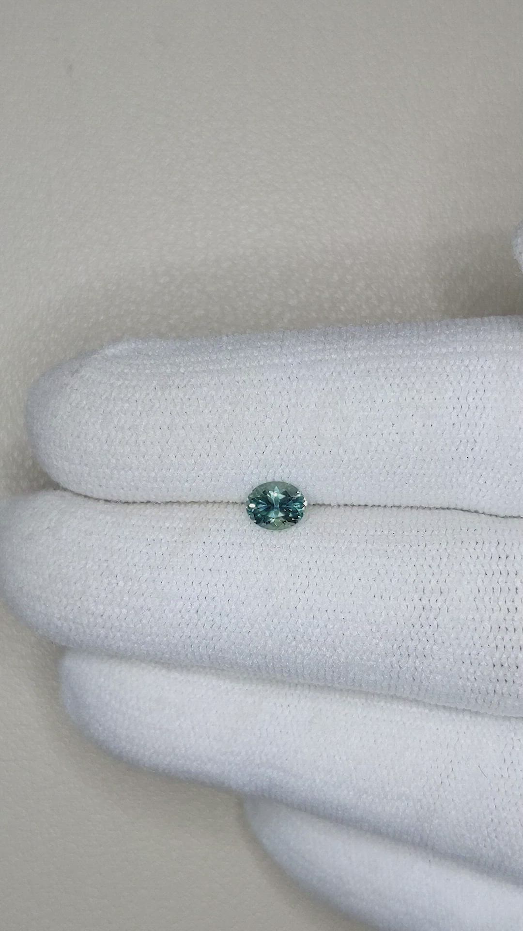 0.47 Ct. Bluish Green Sapphire from Montana Size Video