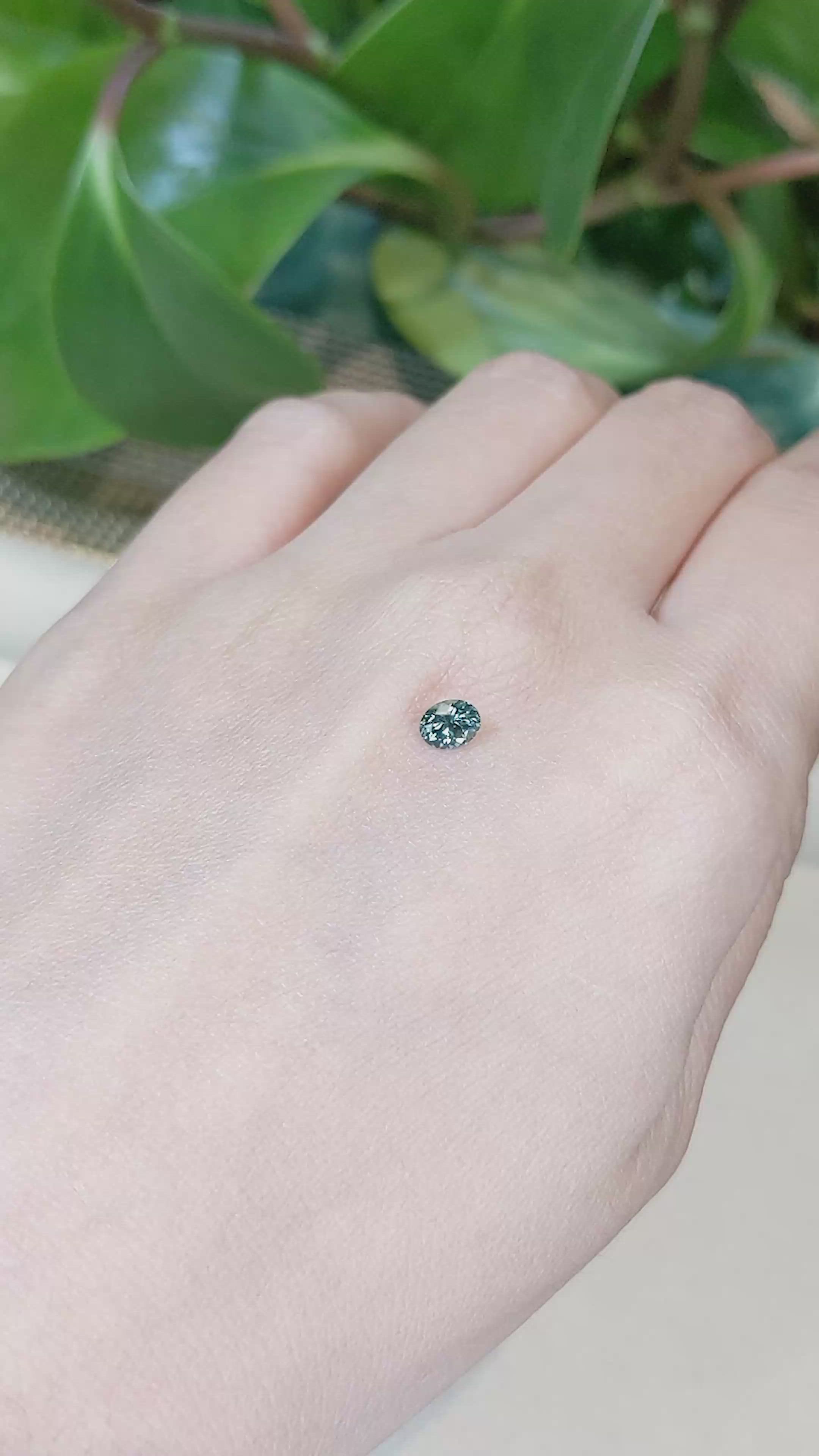 0.47 Ct. Bluish Green Sapphire from Montana Size Video