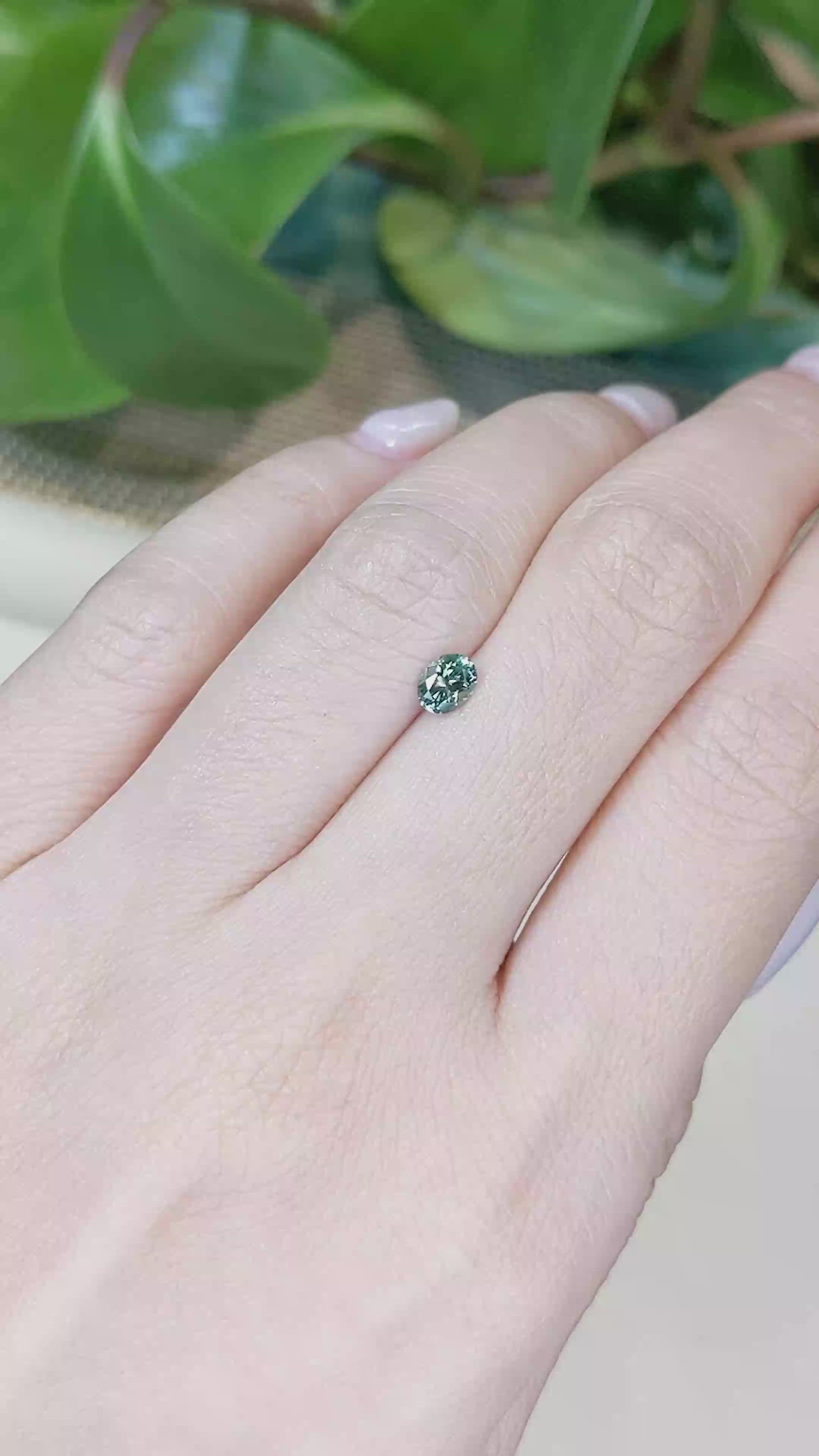 0.47 Ct. Bluish Green Sapphire from Montana Size Video