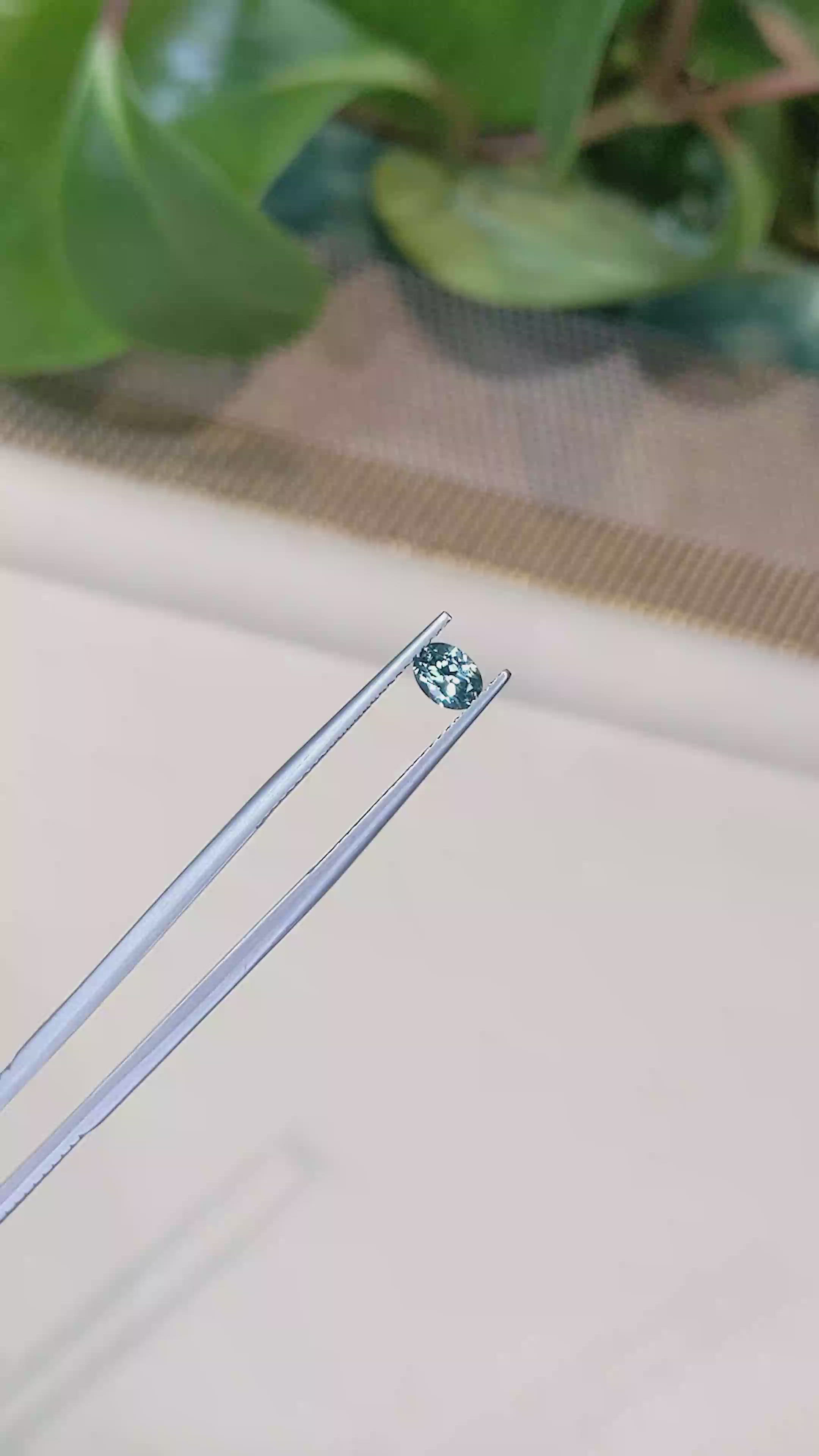 0.47 Ct. Bluish Green Sapphire from Montana Size Video