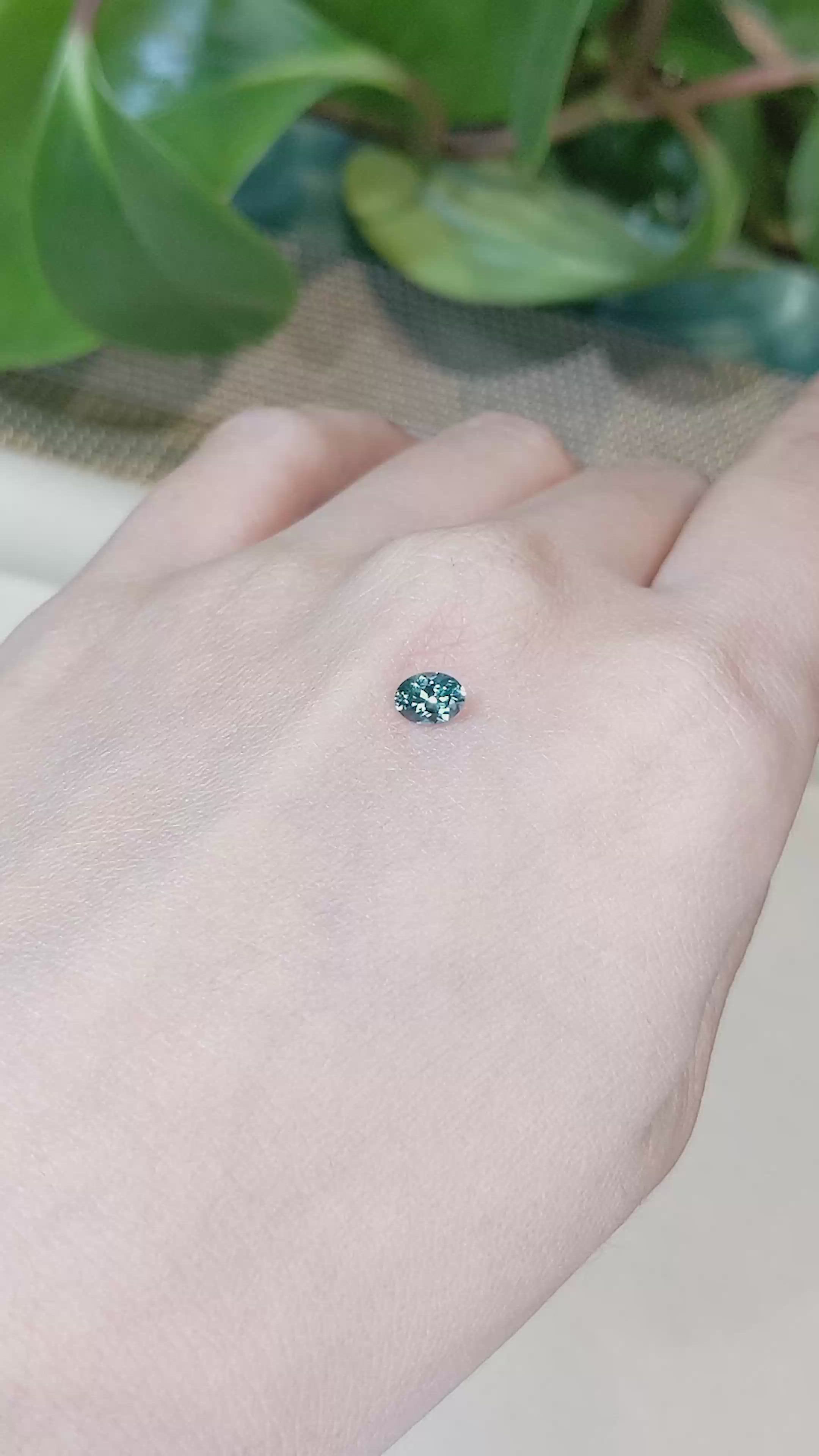 0.47 Ct. Bluish Green Sapphire from Montana Size Video