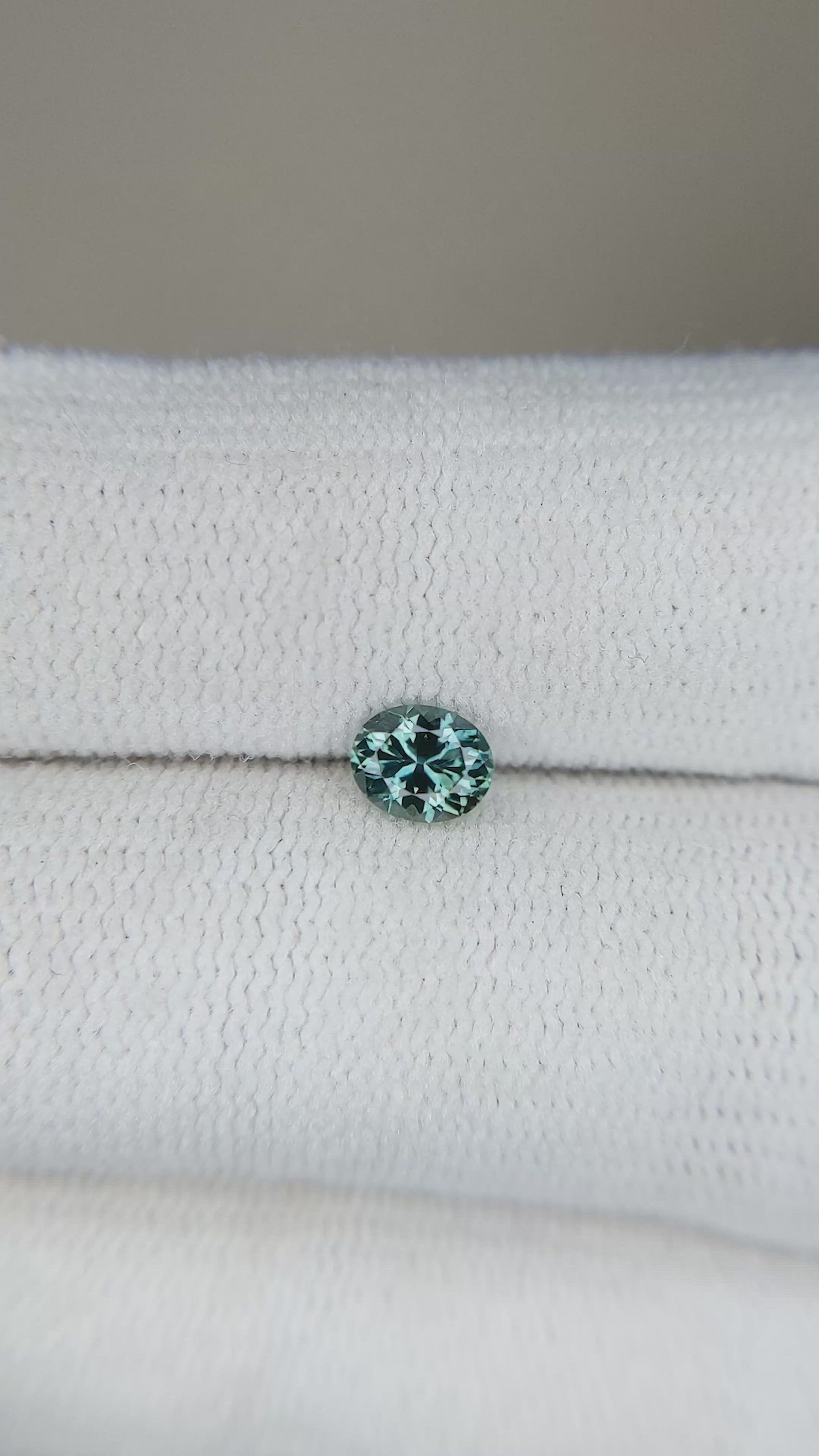 0.46 Ct. Bluish Green Sapphire from Montana Size Video