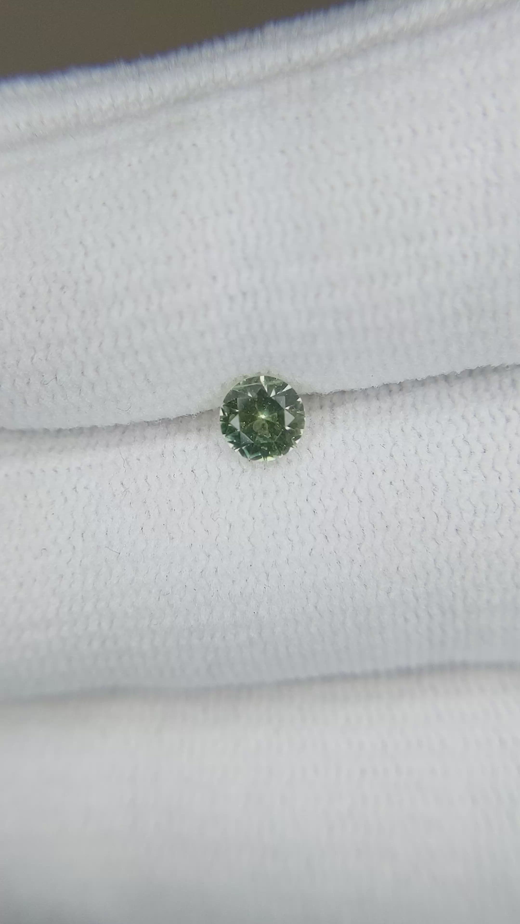 0.46 Ct. Yellowish Green Sapphire from Montana Size Video