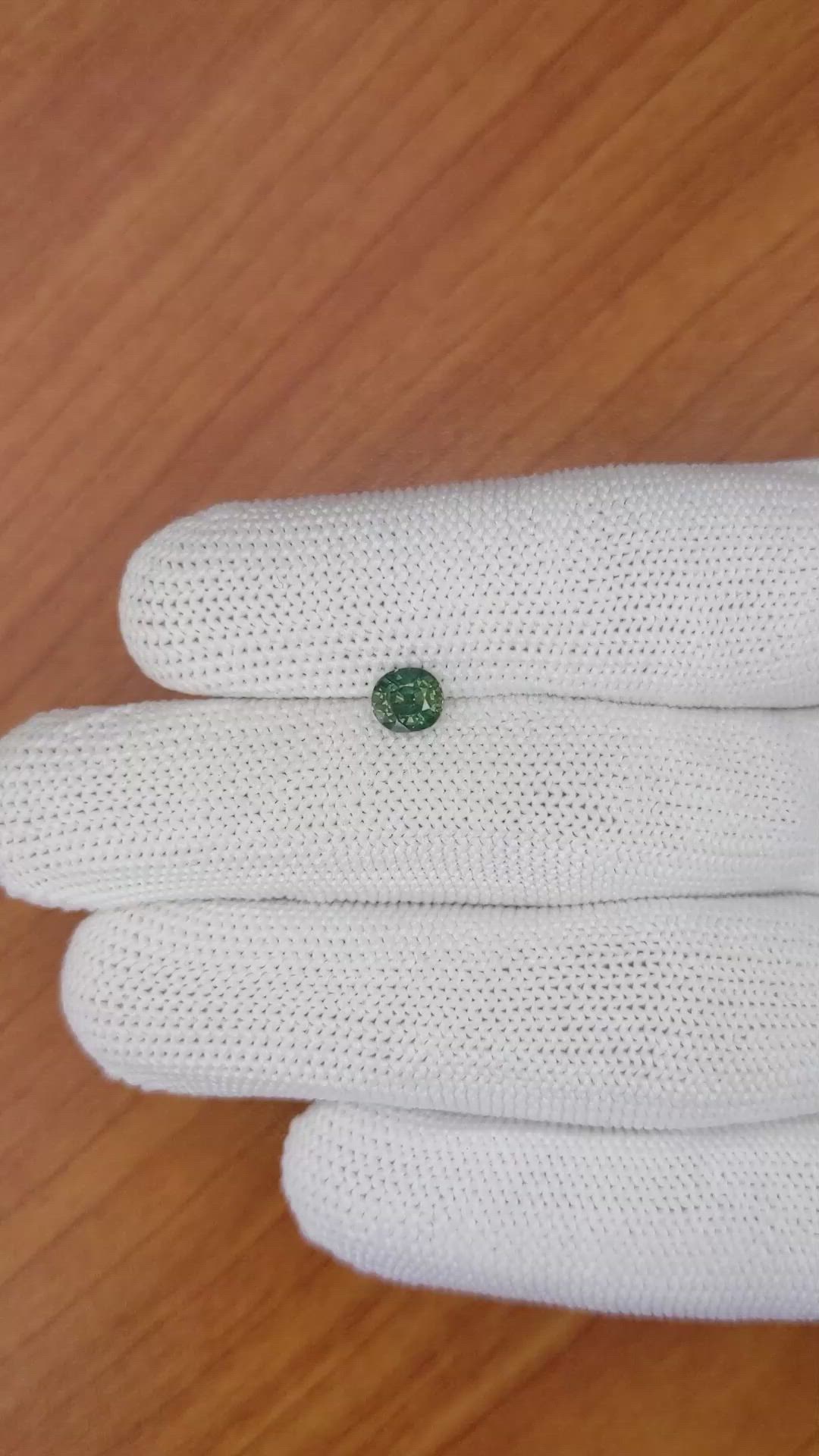0.93 Ct. Bluish Green Sapphire from Madagascar Size Video