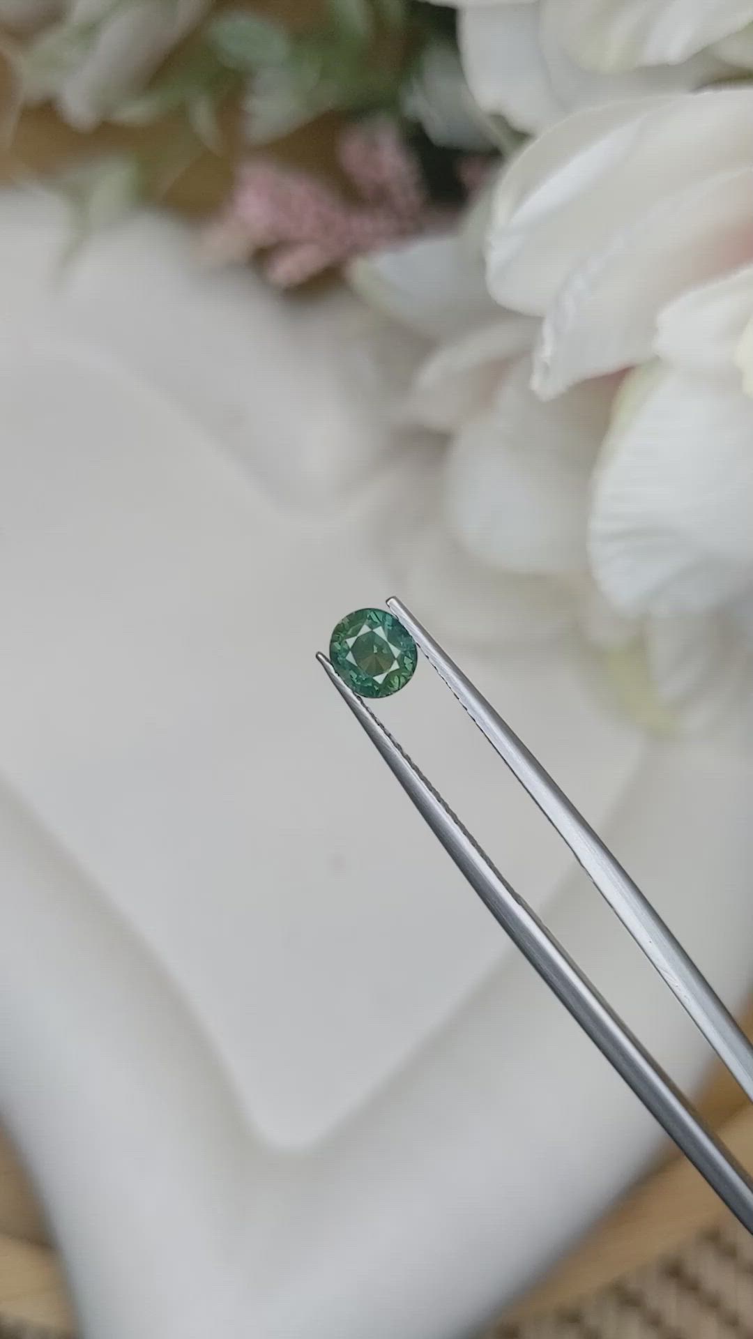 0.93 Ct. Bluish Green Sapphire from Madagascar Size Video