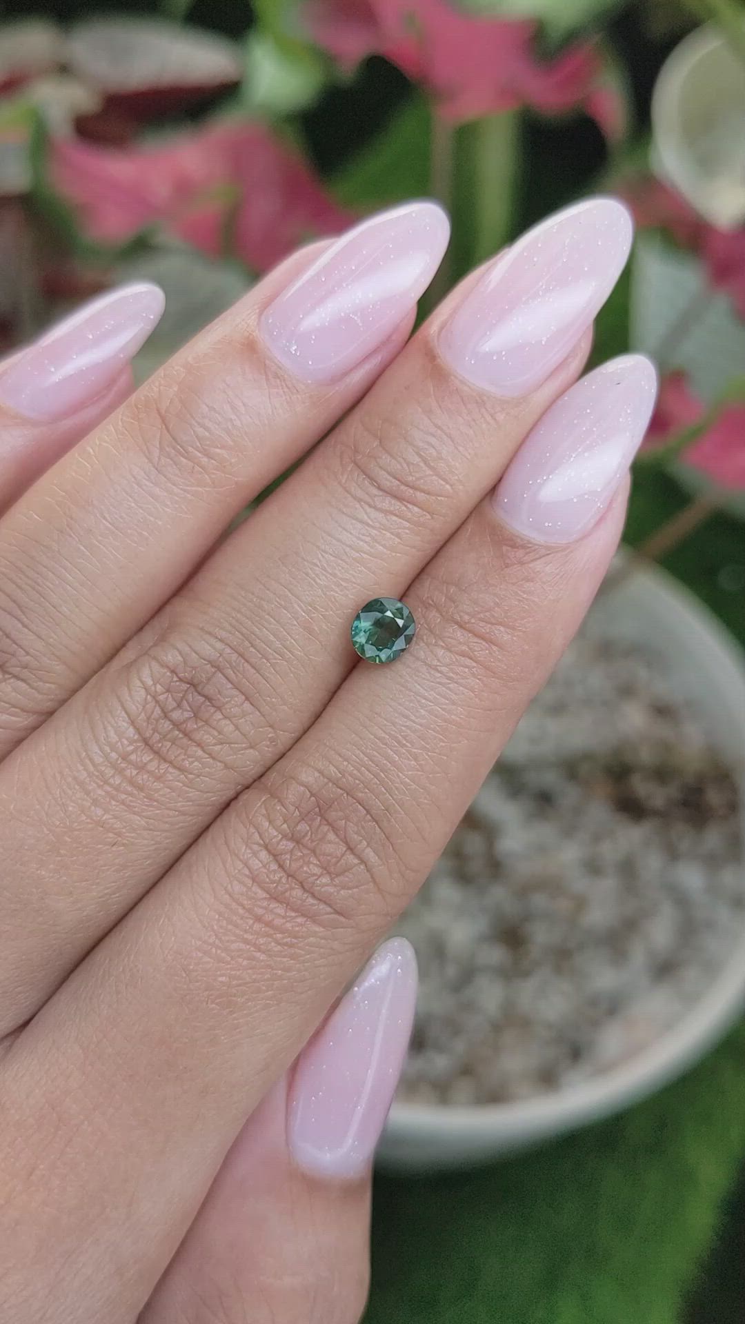 0.93 Ct. Bluish Green Sapphire from Madagascar Size Video