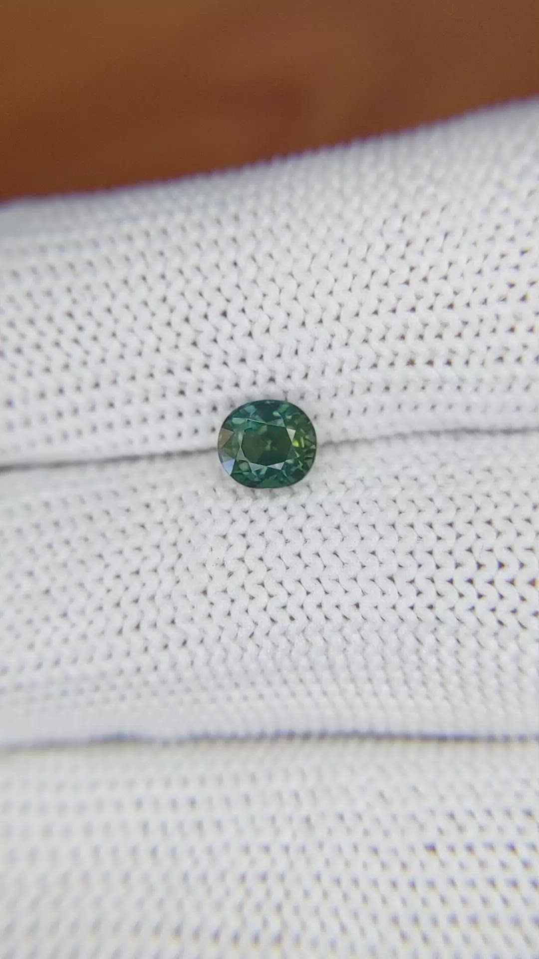 0.93 Ct. Bluish Green Sapphire from Madagascar Size Video