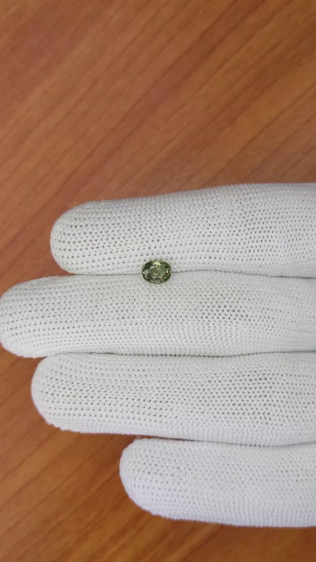 0.68 Ct. Brownish Green Sapphire from Ceylon (Sri Lanka) Size Video