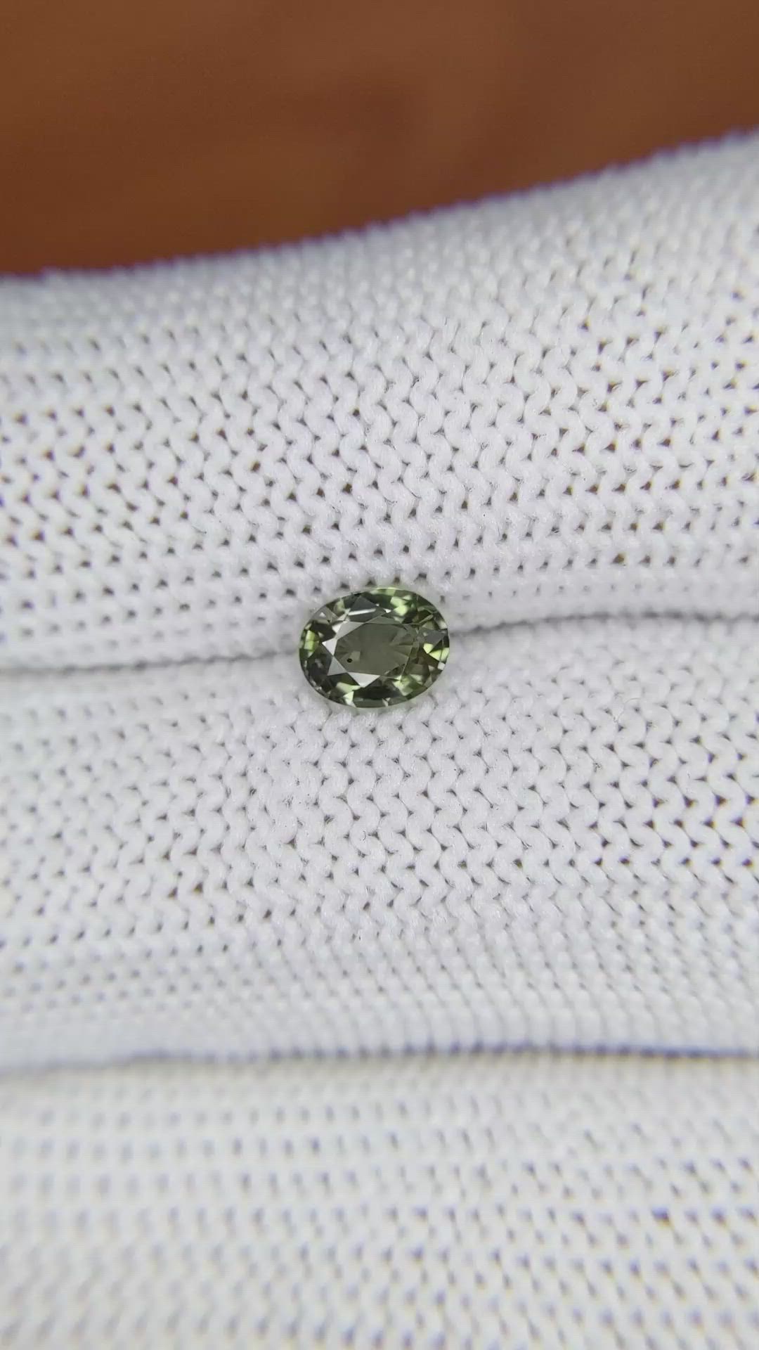0.68 Ct. Brownish Green Sapphire from Ceylon (Sri Lanka) Size Video